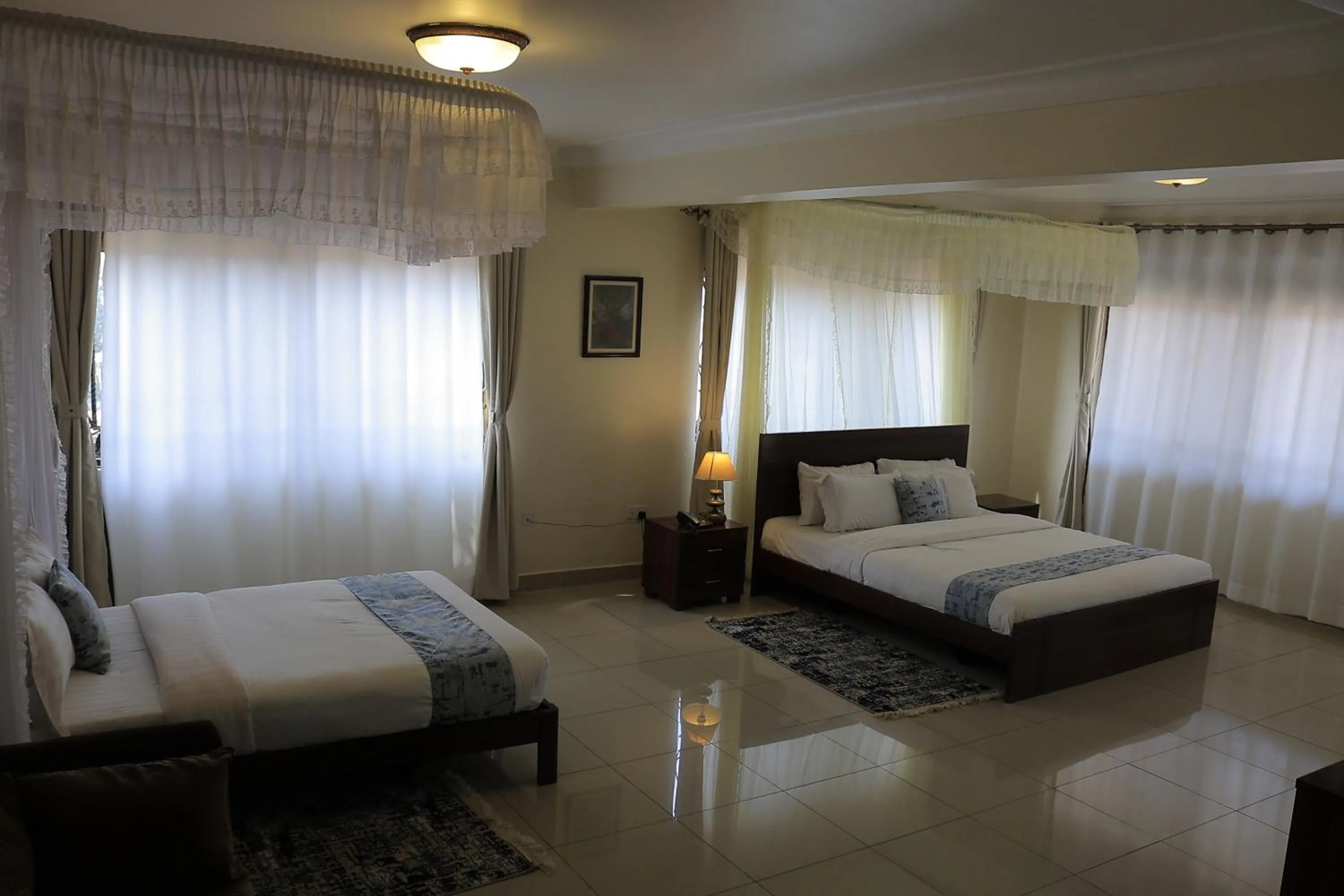 Photo of the whole room, Bed in Reinah Tourist Hotel