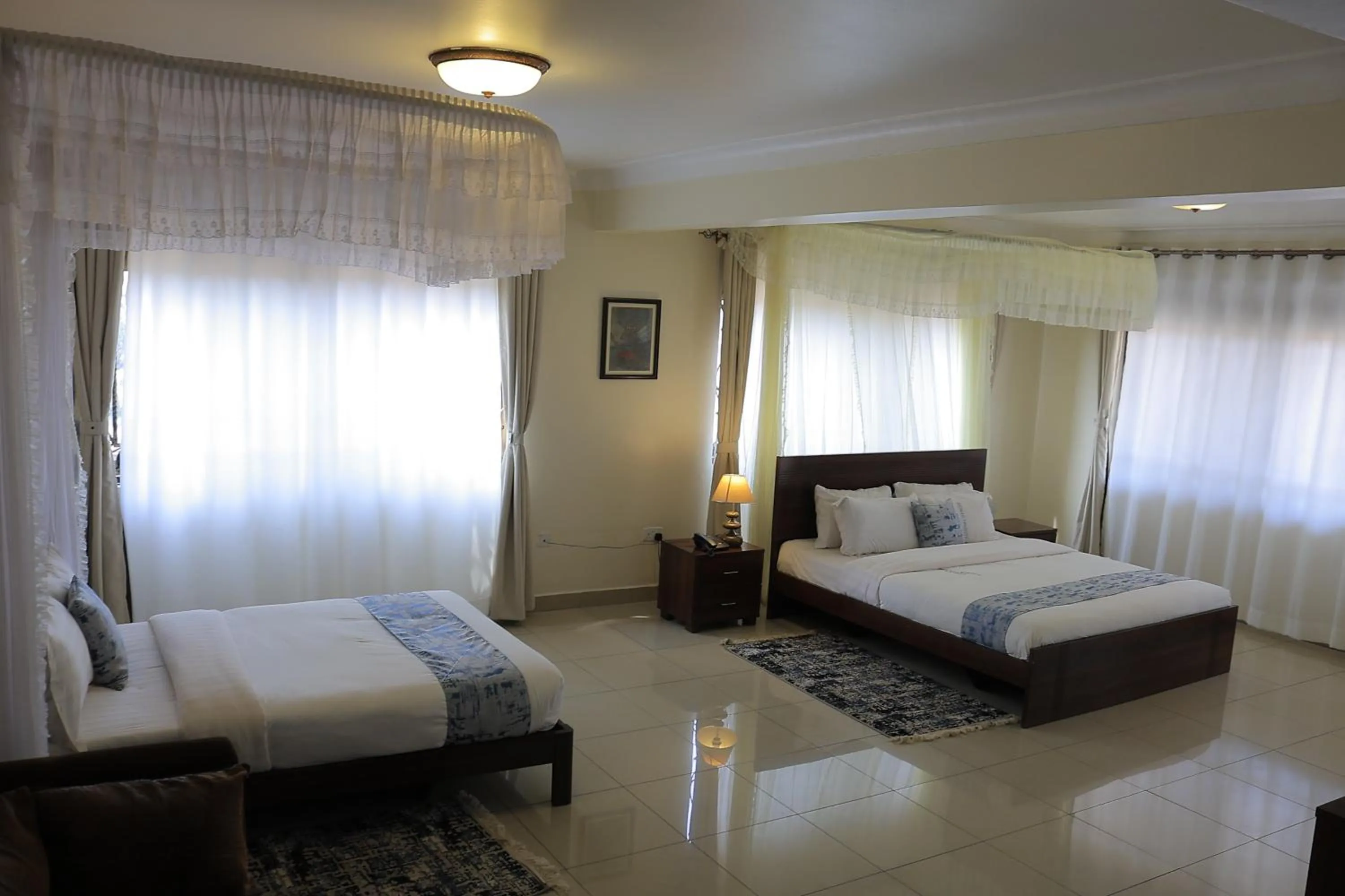 Photo of the whole room, Bed in Reinah Tourist Hotel