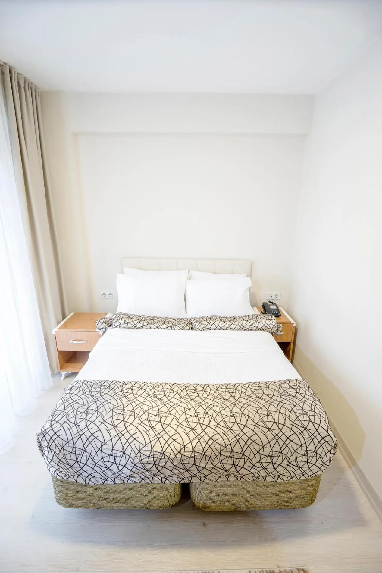 Bed in The Corner Inn Hotels By Suit