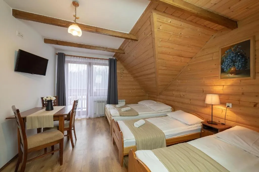 Photo of the whole room, Bed in Chata u Bronka