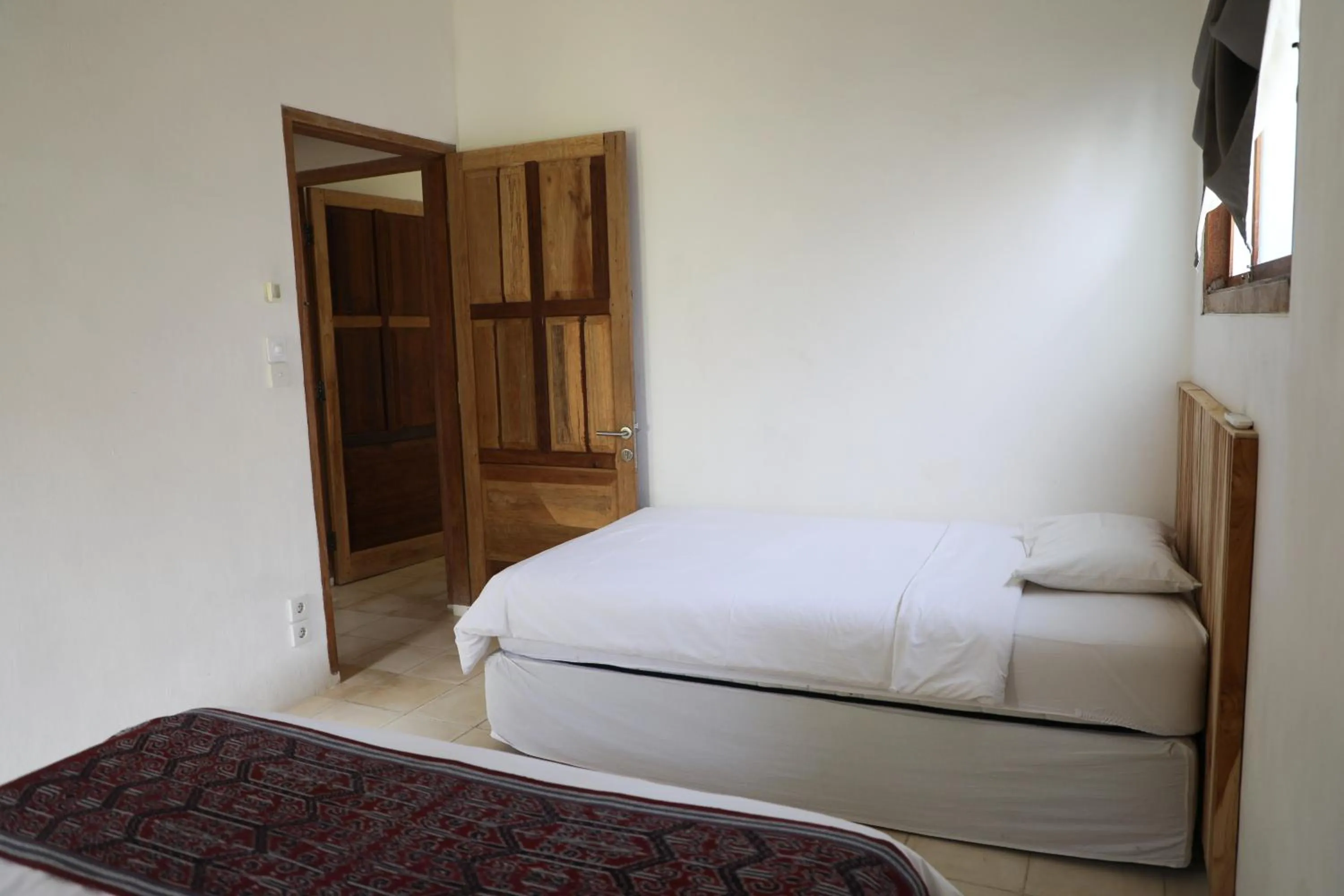 Bed in Villa Tom & Lucie Bingin Beach