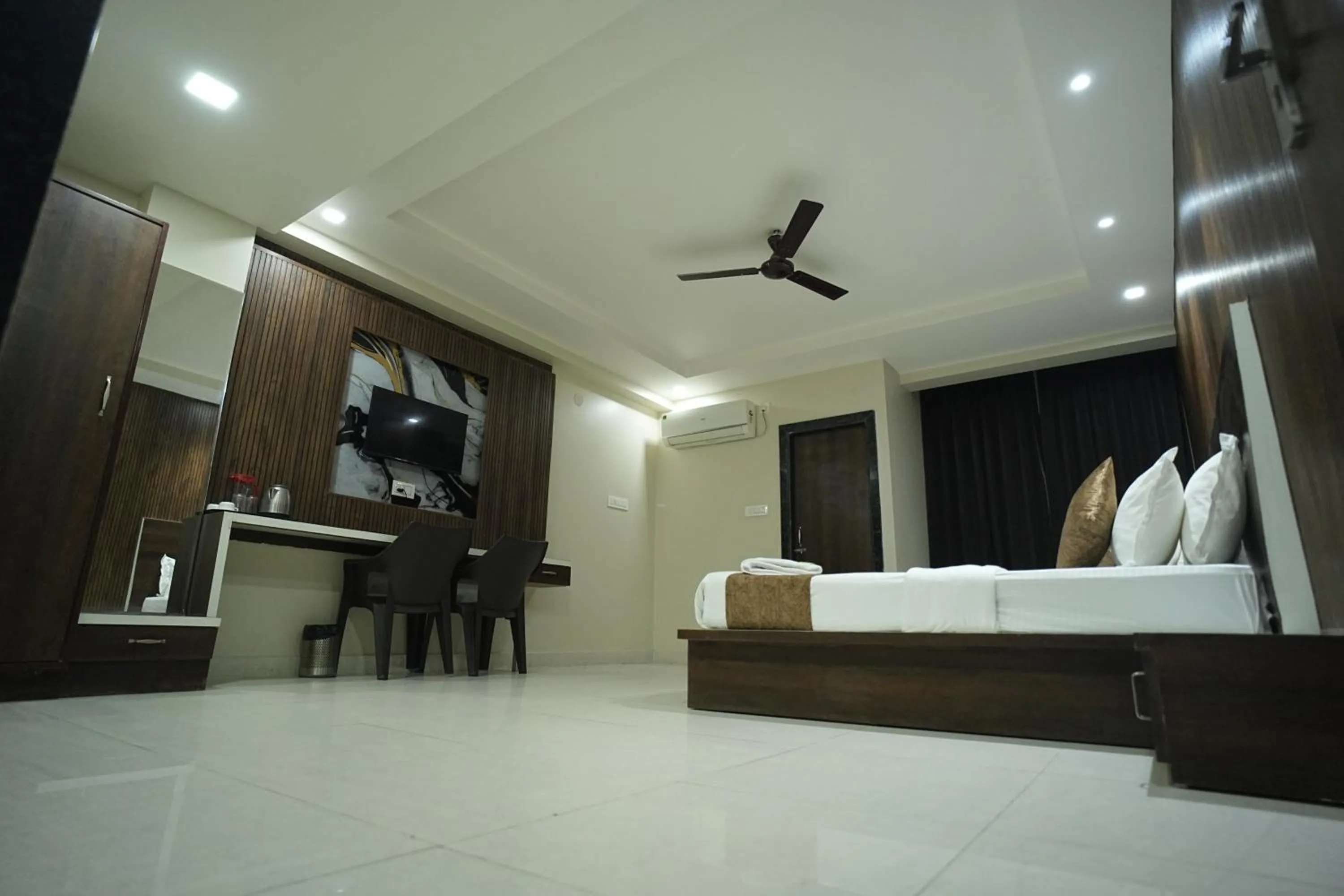 Bed in Hotel Jay Palace