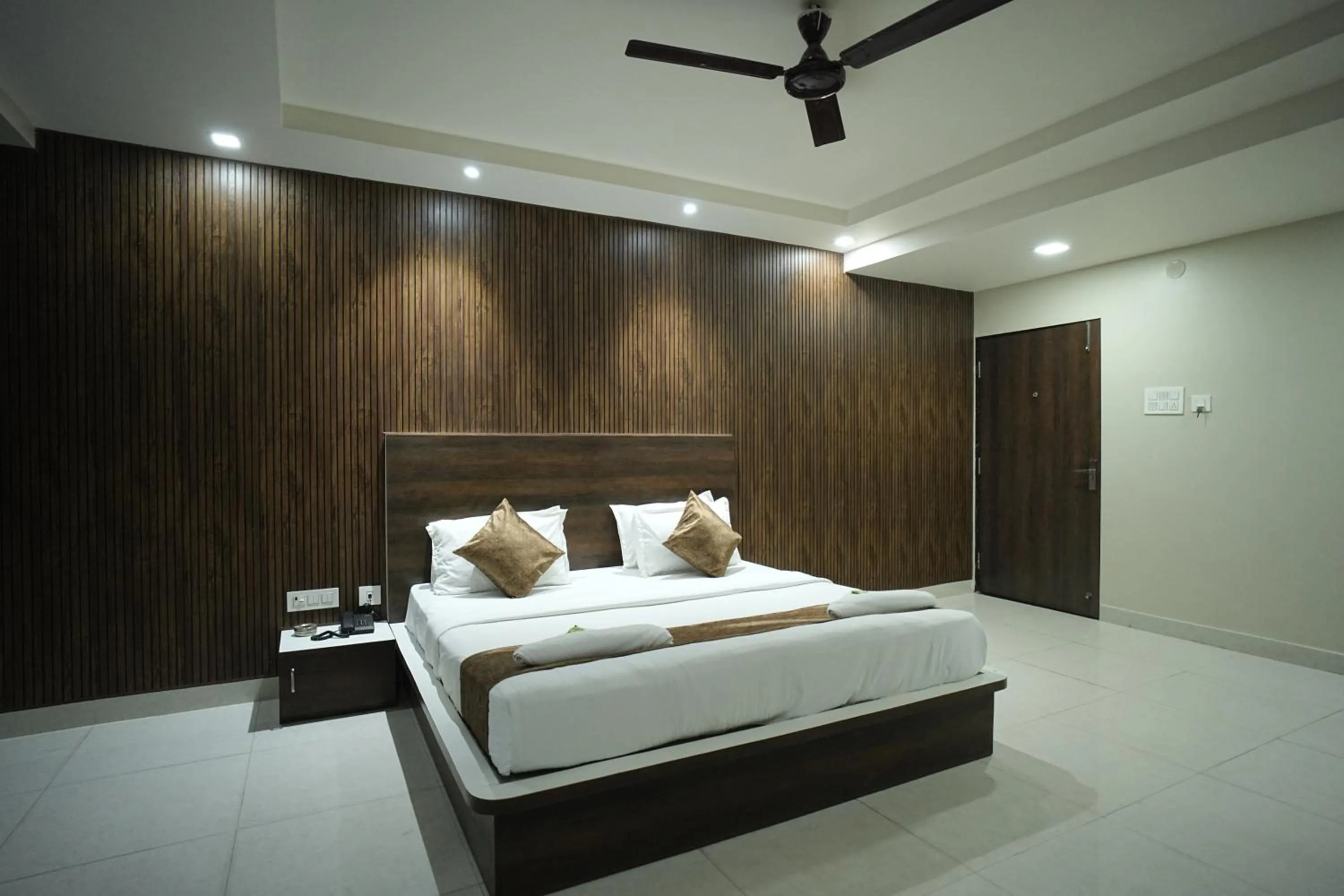 Bed in Hotel Jay Palace