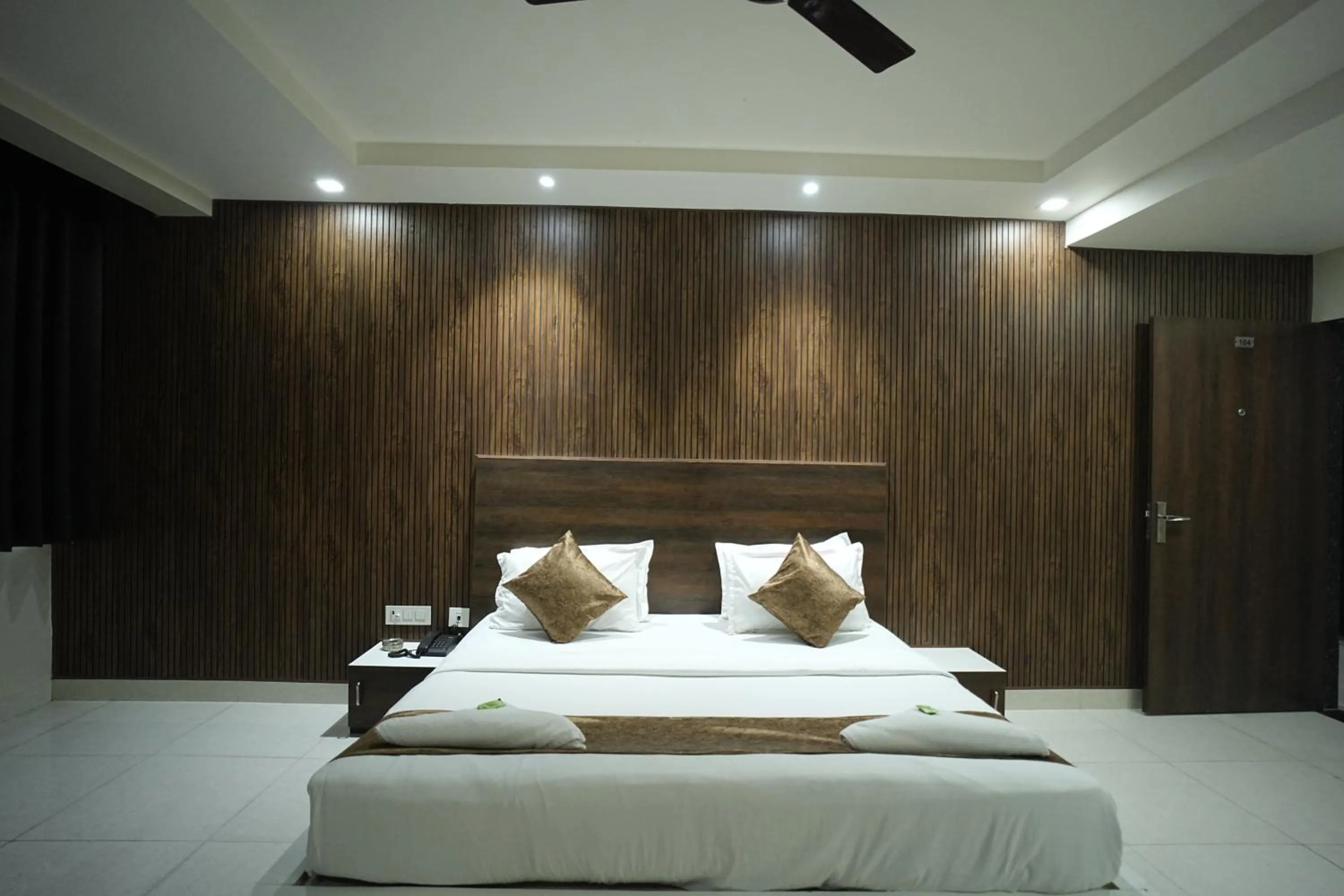 Bed in Hotel Jay Palace