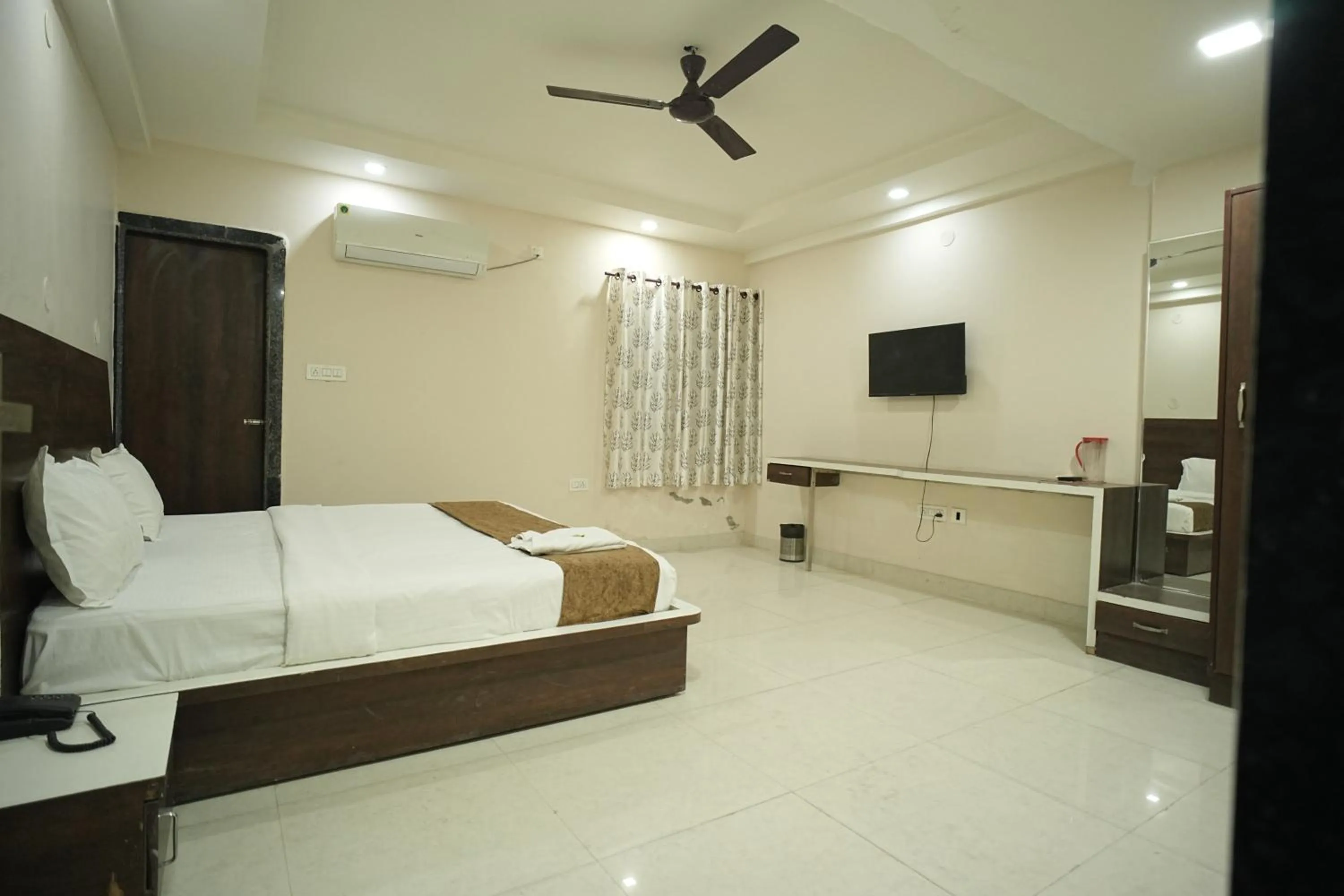Bed in Hotel Jay Palace