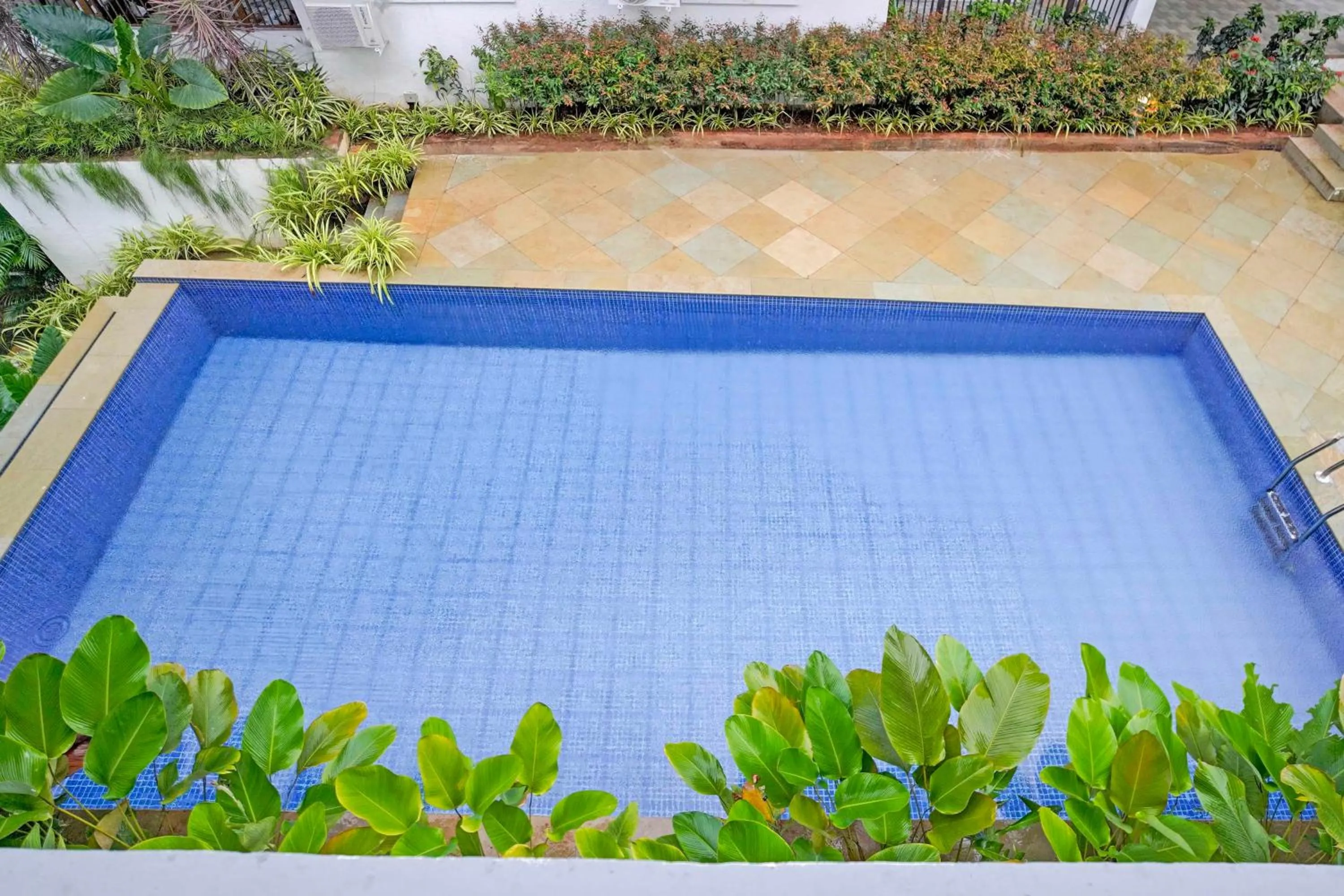 Swimming pool in Sereno By Dancenter - 1 BHK Apartment In Siolim