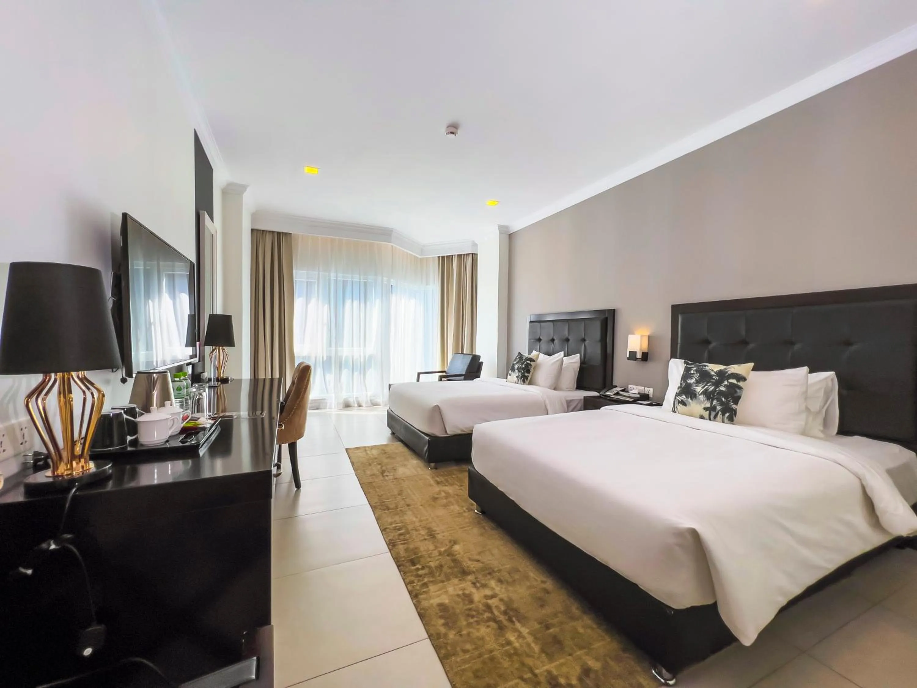 Bed in Queenco Hotel & Casino