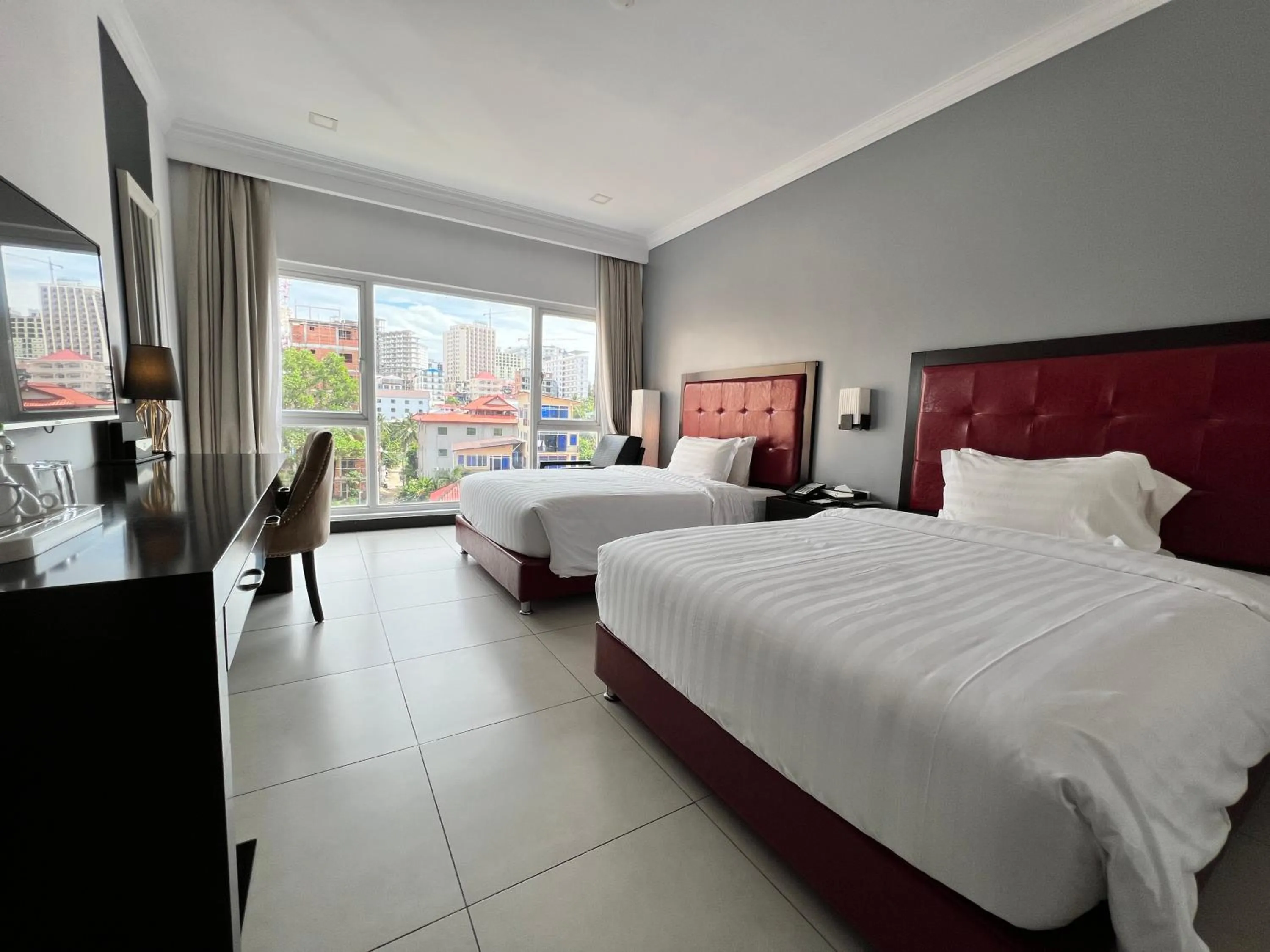 Photo of the whole room, Bed in Queenco Hotel & Casino