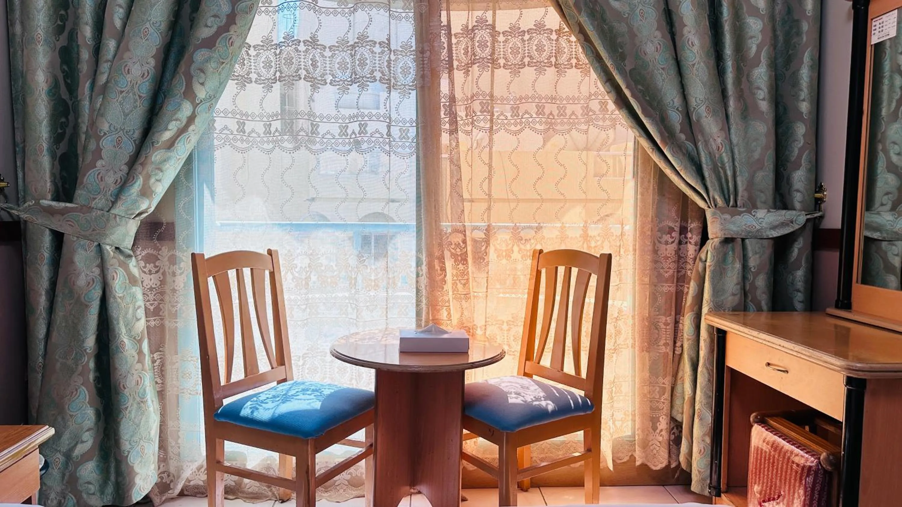 Seating area in Collection O San Marino Hotel