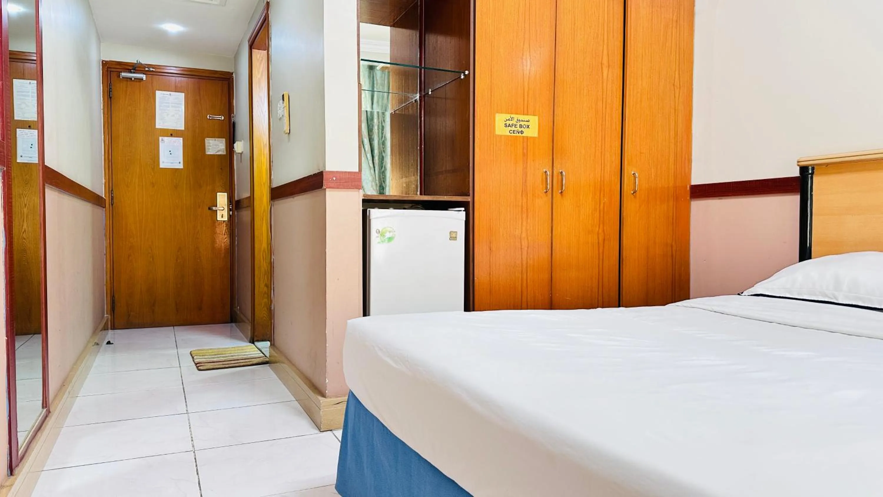 Photo of the whole room, Bed in Collection O San Marino Hotel