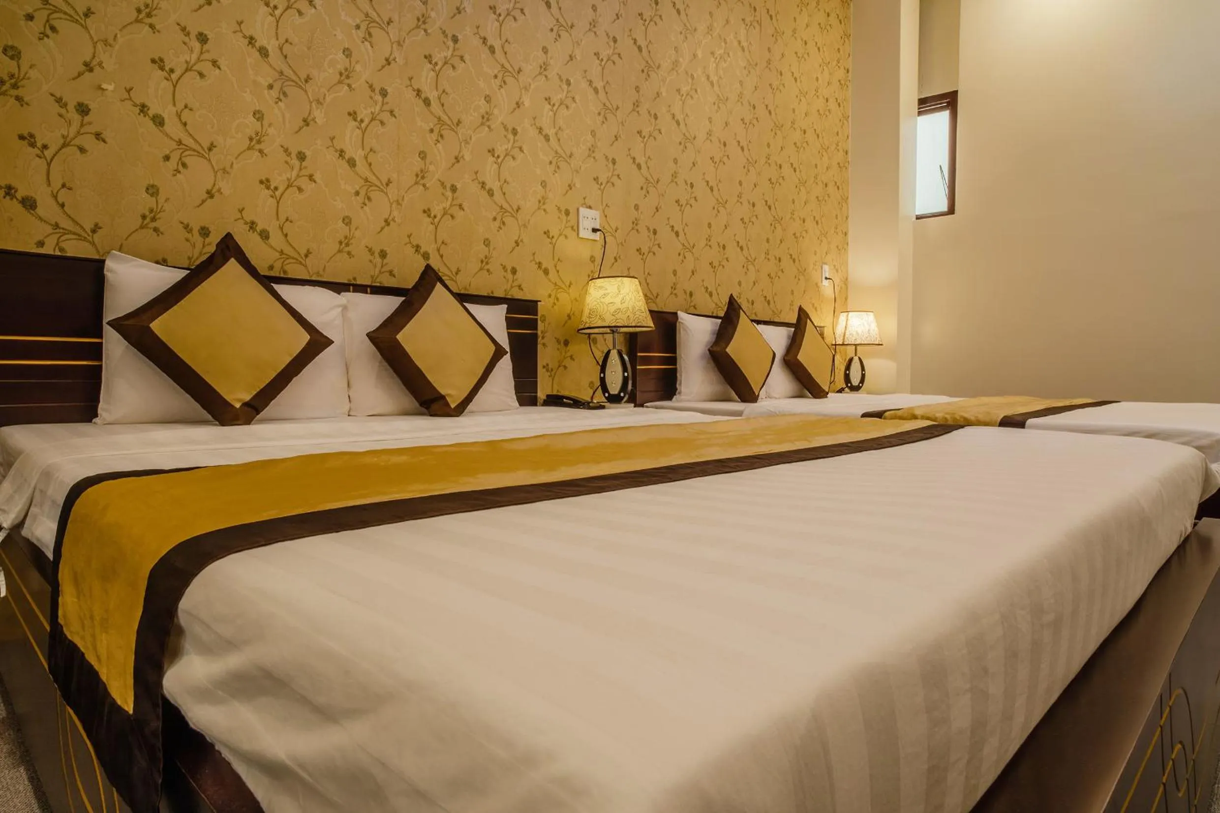 Bed in Dong Bao Hotel