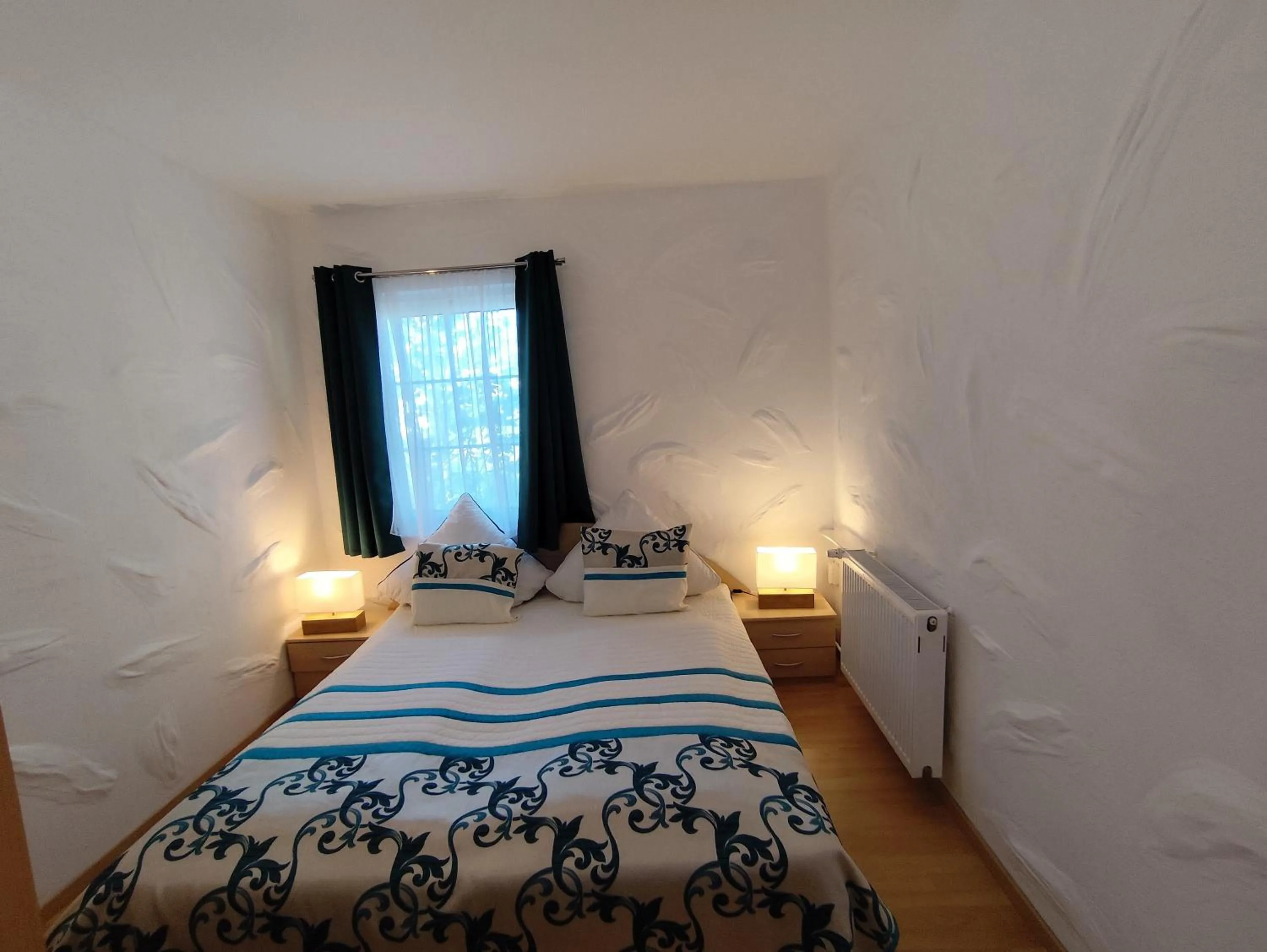Bed in City Ferienhaus Vulkaneifel
