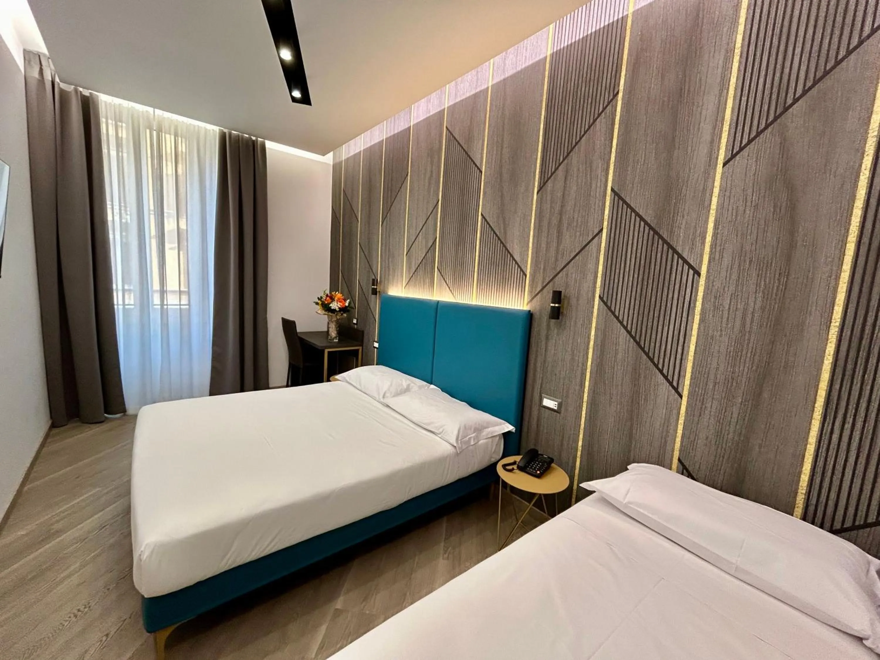 Bed in Hotel Contilia