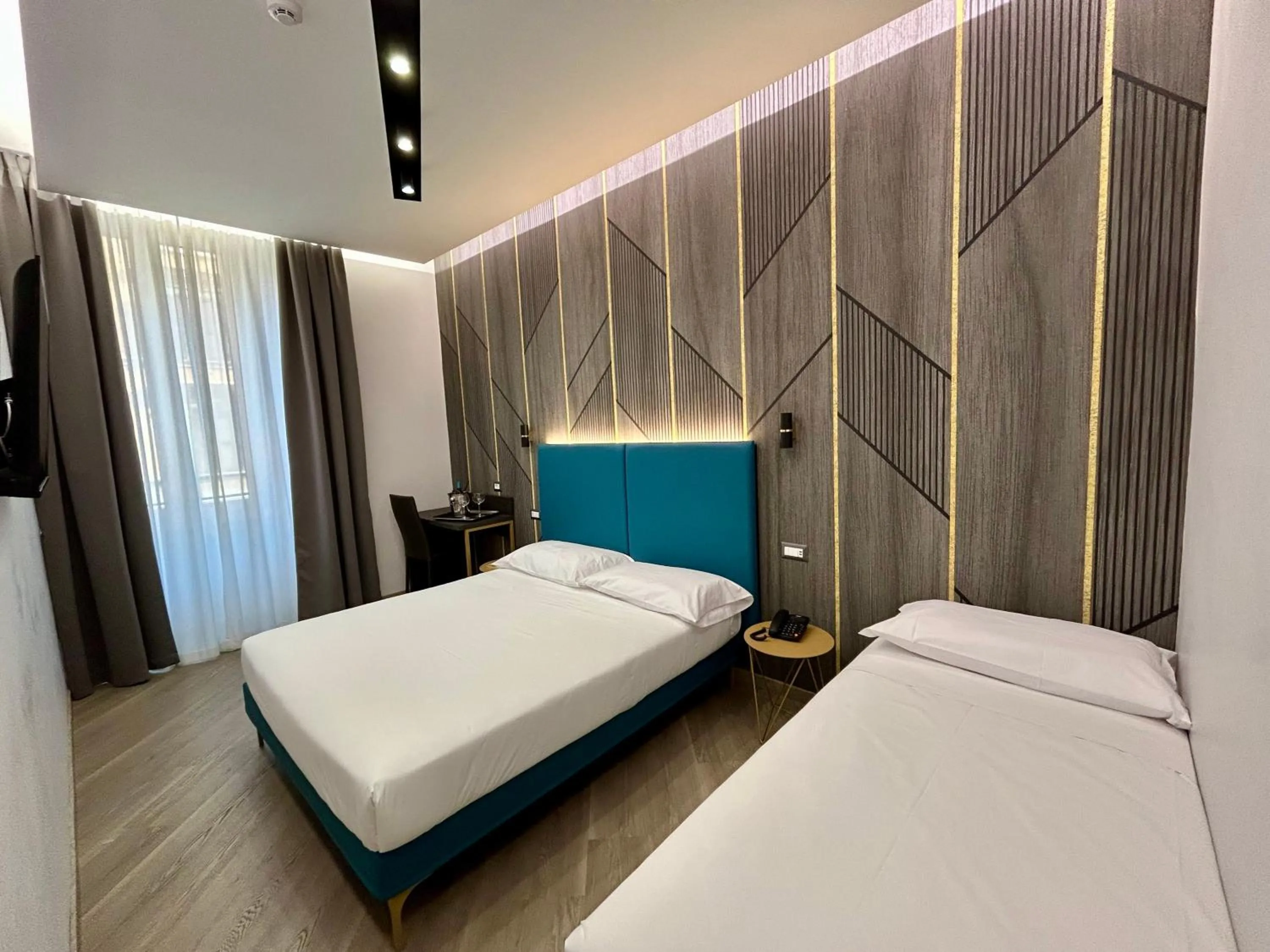 Bed in Hotel Contilia