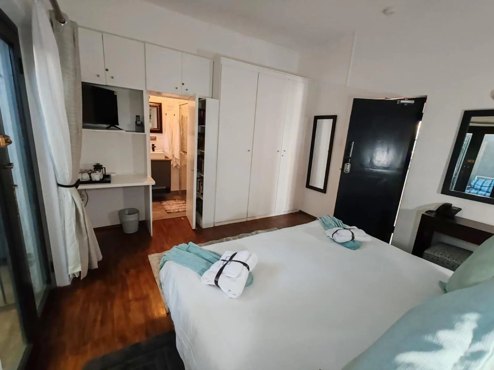 Shower, Bed in Point B Guest House -Sustainable Solar Energy