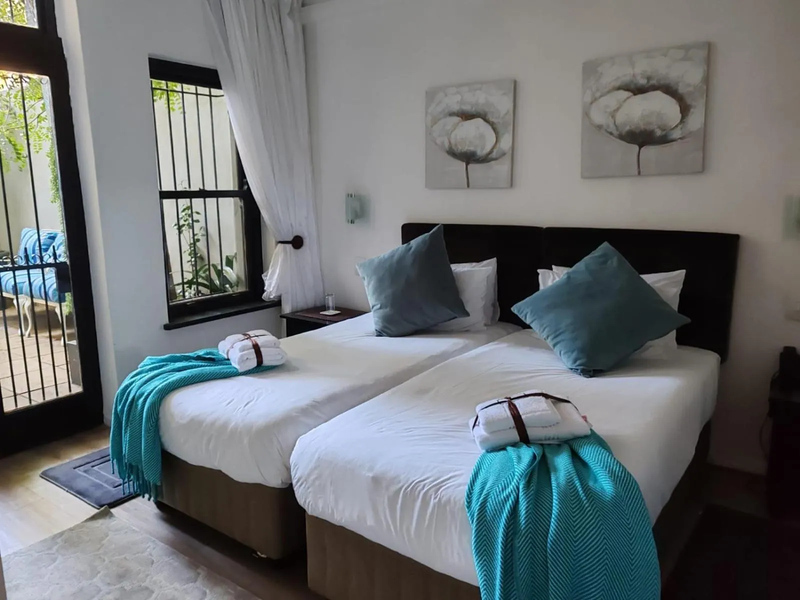 Patio, Bed in Point B Guest House -Sustainable Solar Energy