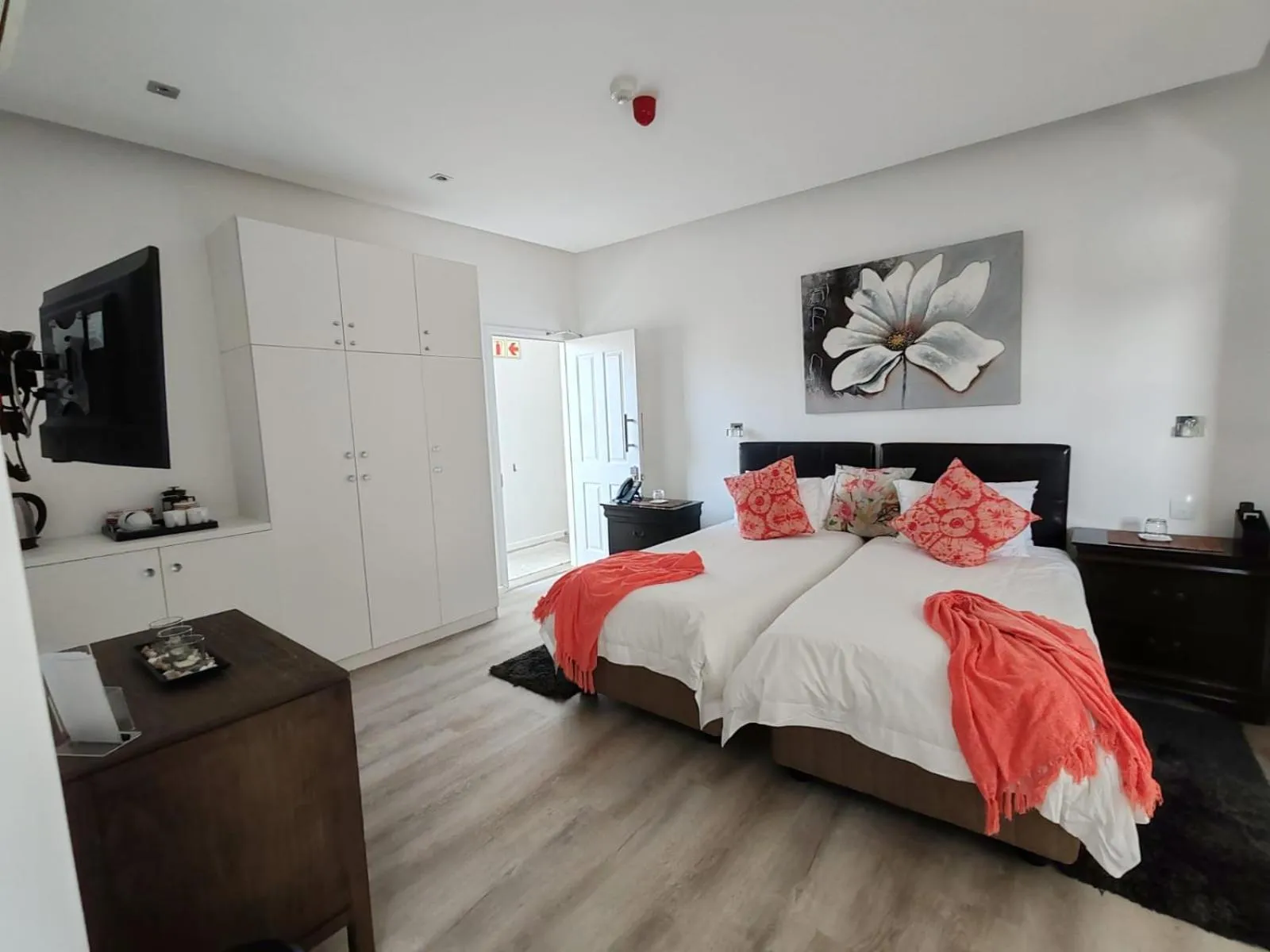 Bed in Point B Guest House -Sustainable Solar Energy