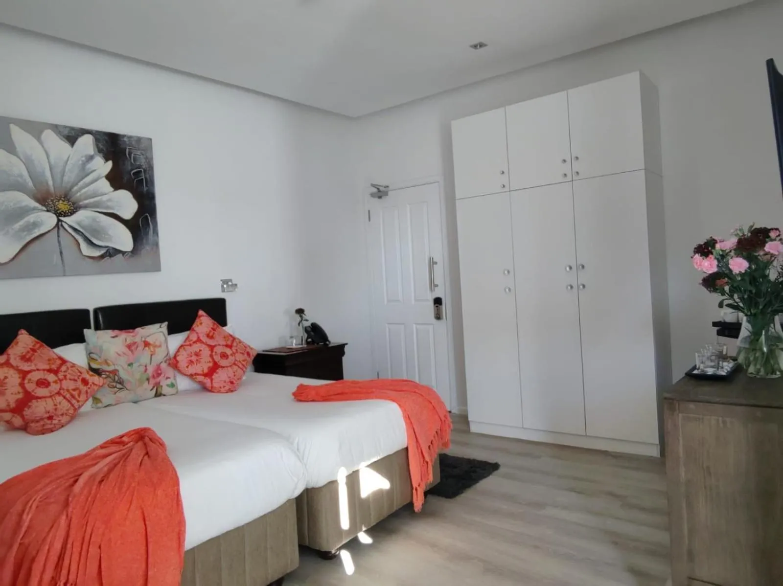 Bed in Point B Guest House -Sustainable Solar Energy