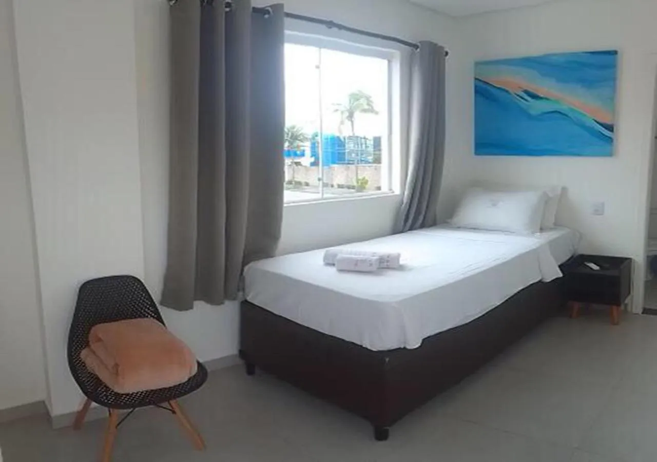 Bathroom, Bed in Hotel Rosa da Ilha Guaruja - 80m do mar, 02 piscinas, sala de jogos, brinquedão de percurso para crianças