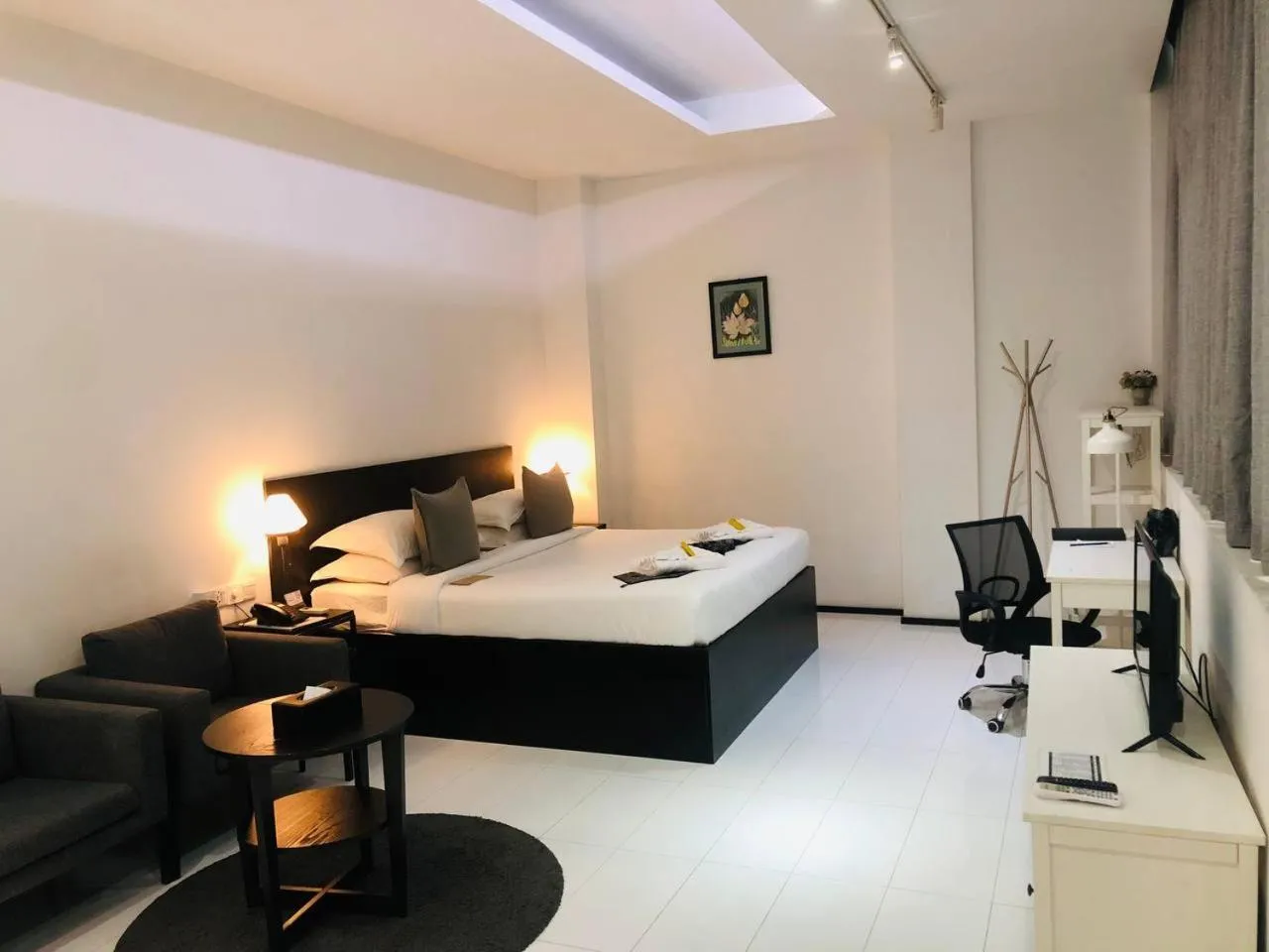 Bedroom in YAMA HOTEL & ROOFTOP BAR