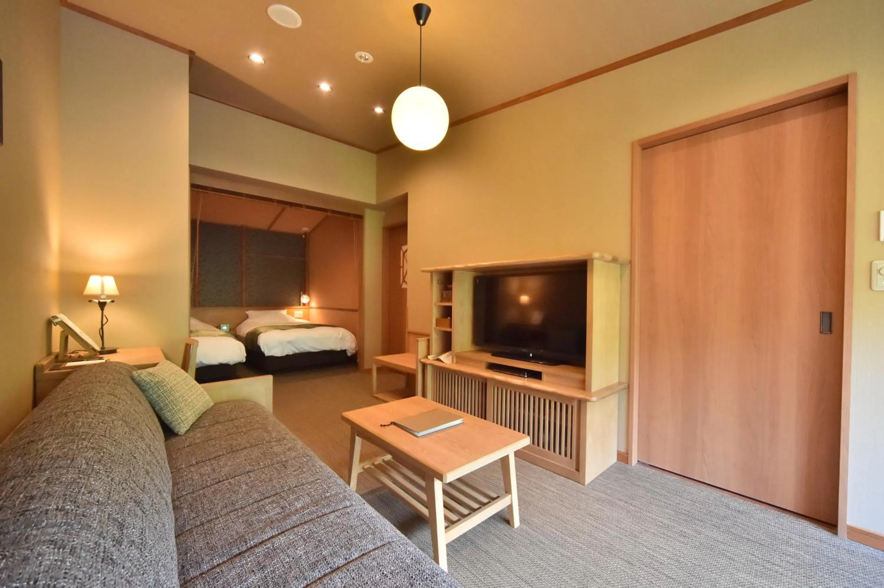 Living room, Bed in La Vista Akangawa