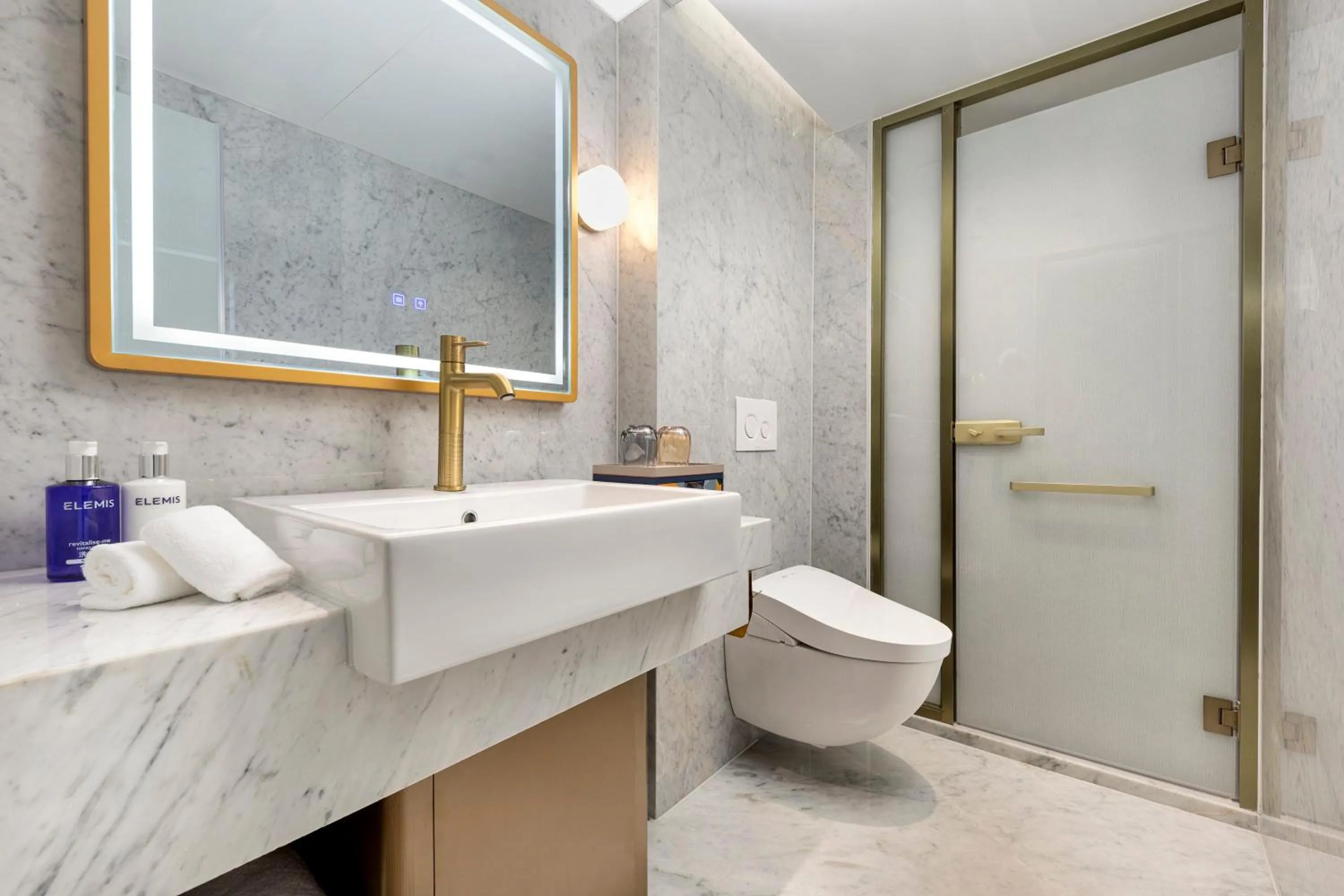 Bathroom in voco Lianyungang Haizhou Bay by IHG