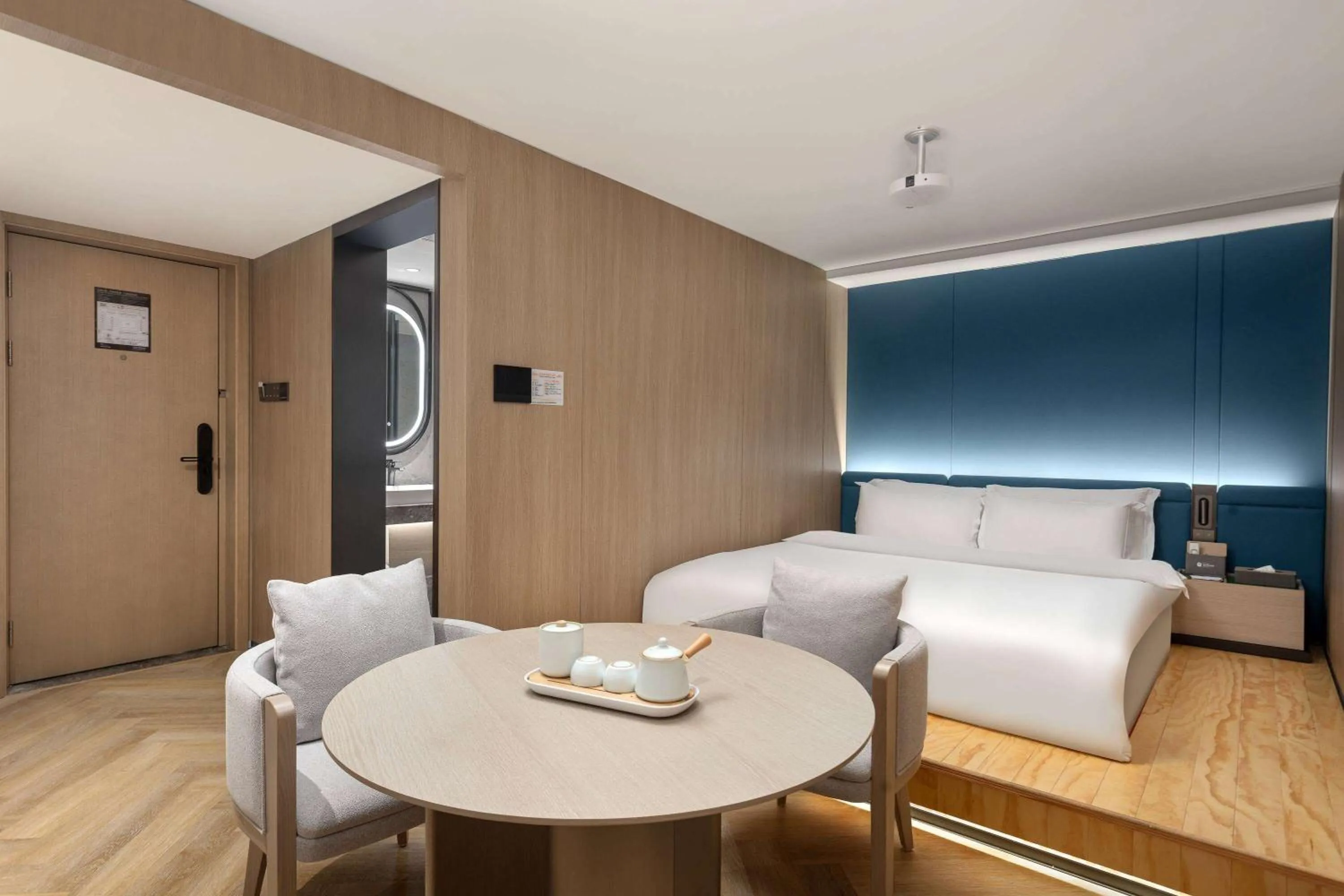 Photo of the whole room in Ramada Encore by Wyndham Wuhan Int'l Conference Center