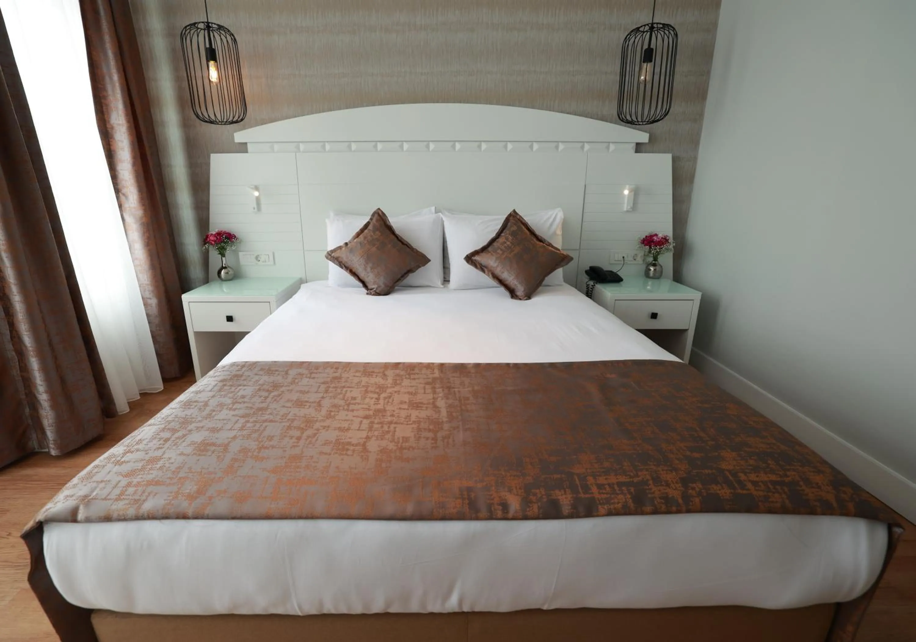 Bed in Nova Plaza Orion Hotel