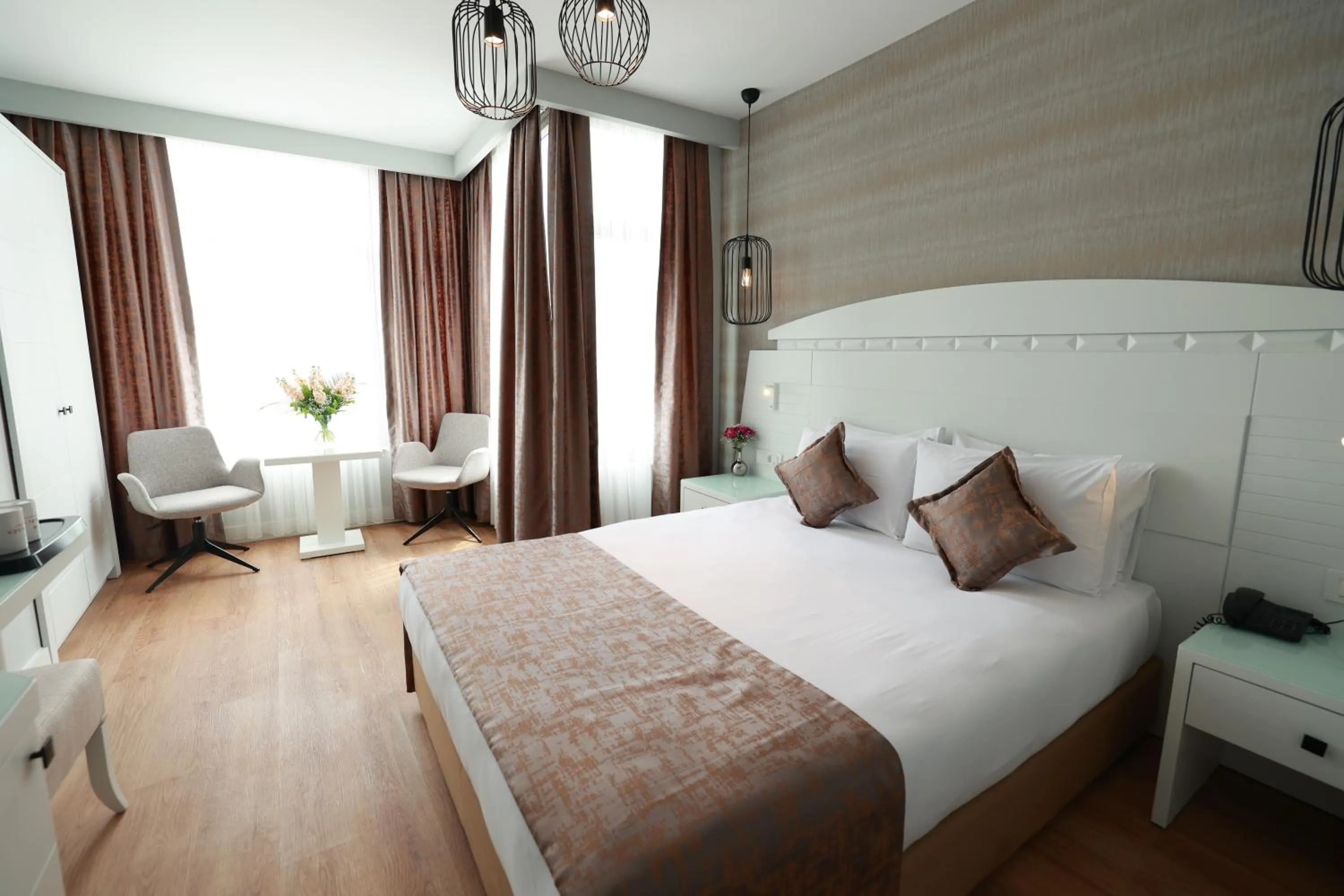 Bed in Nova Plaza Orion Hotel