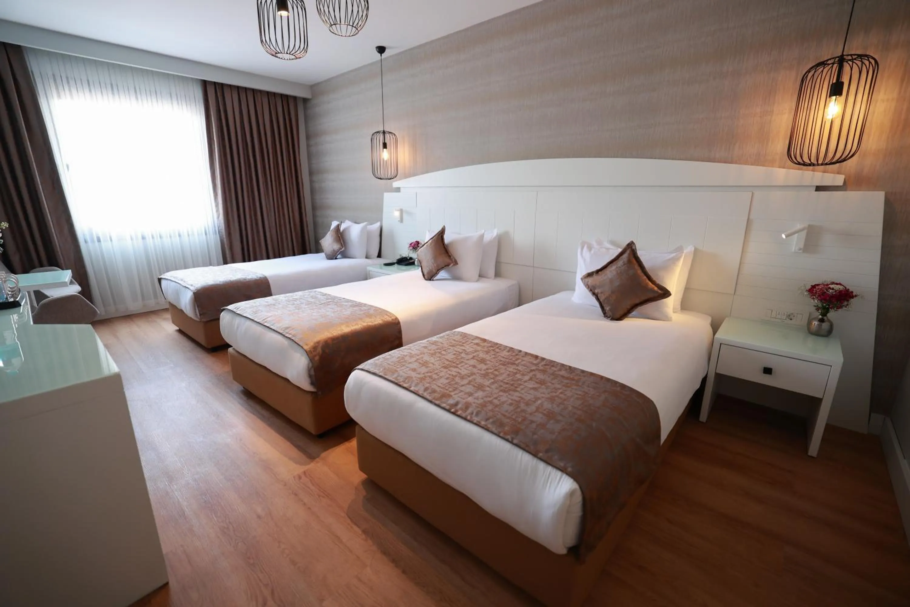 Bed in Nova Plaza Orion Hotel