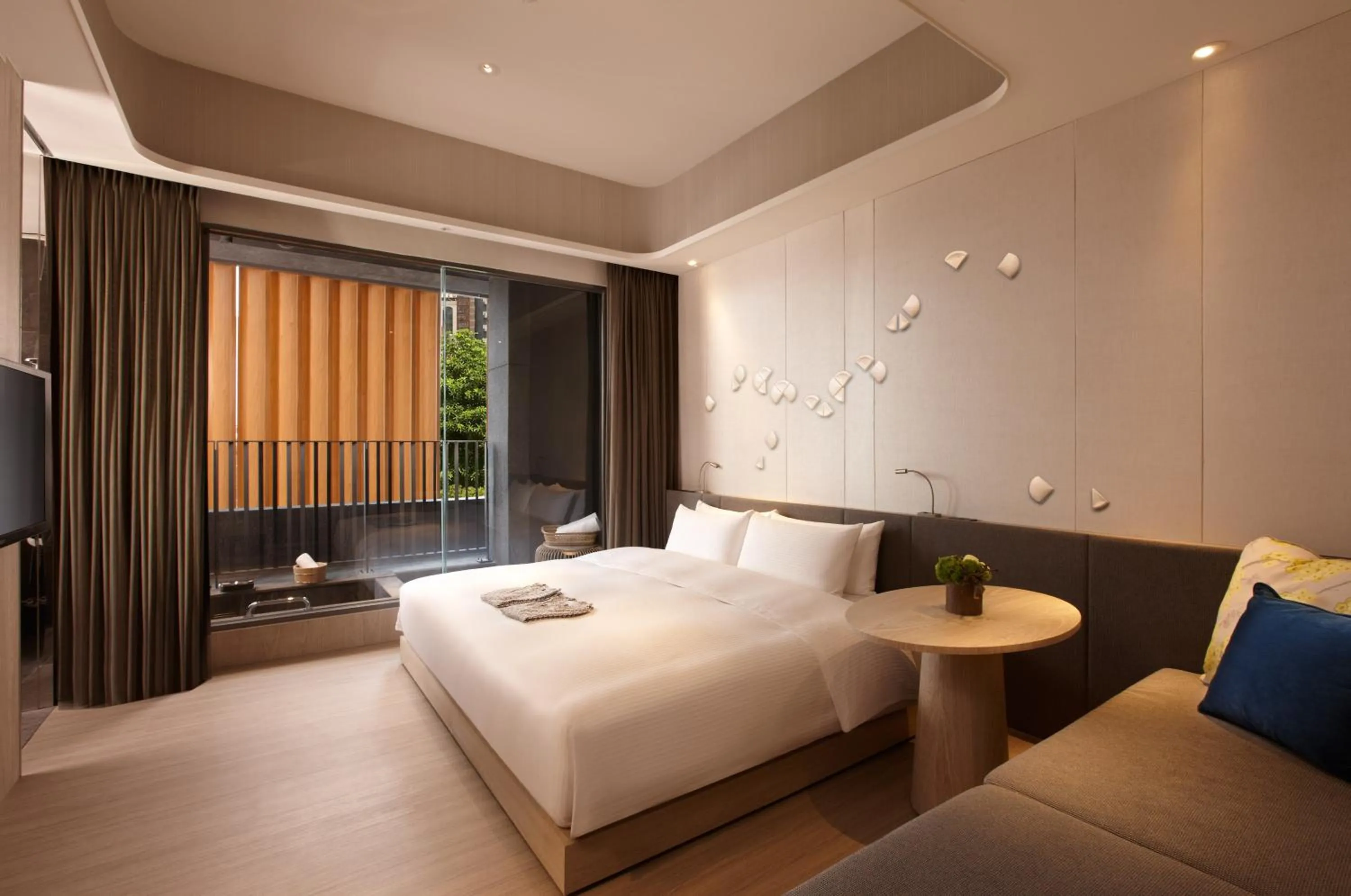 Bed in 礁溪晶泉丰旅 Wellspring by Silks Jiaoxi