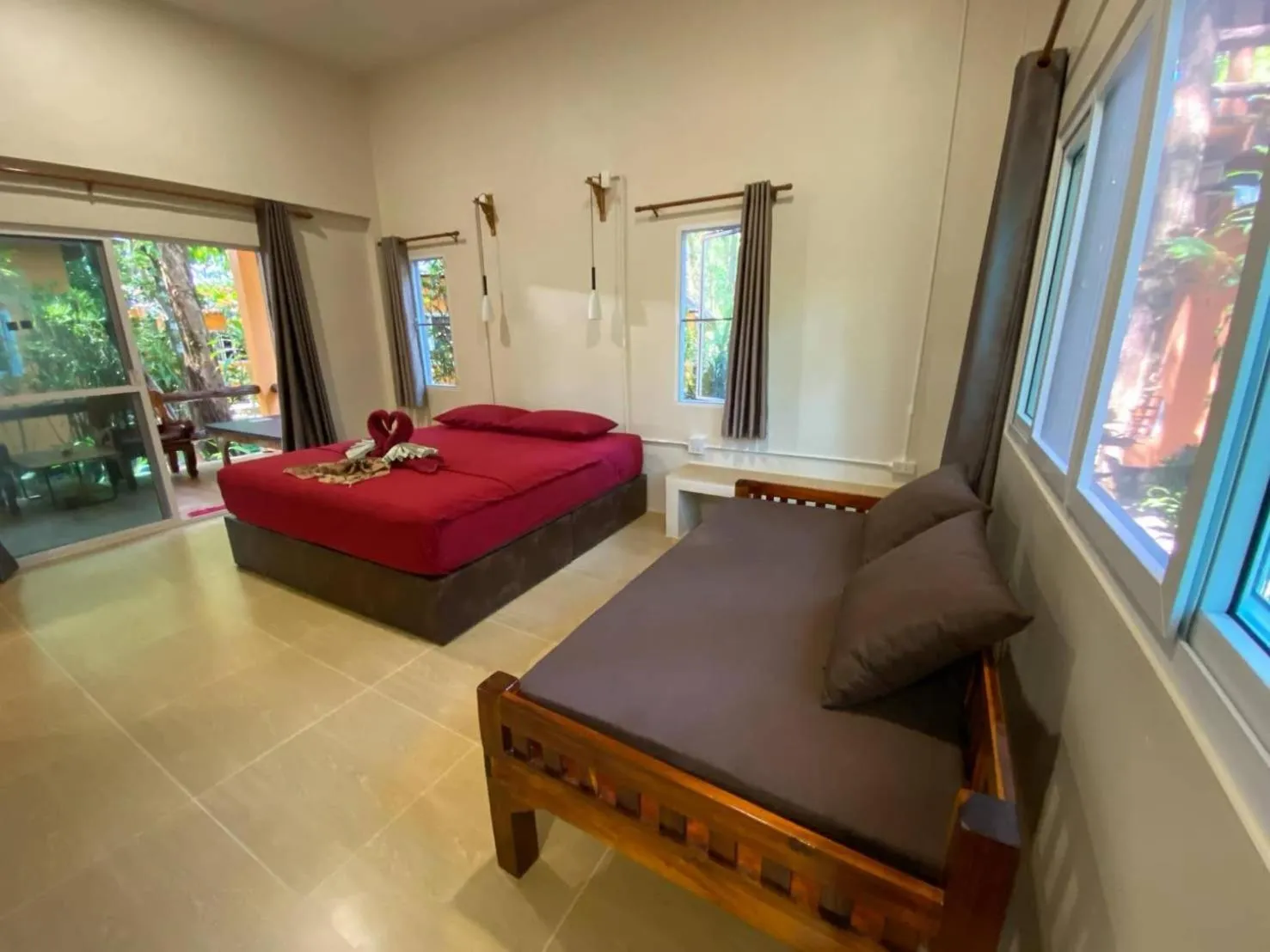 Bed in JJ Beach Resort & JJ Seafood