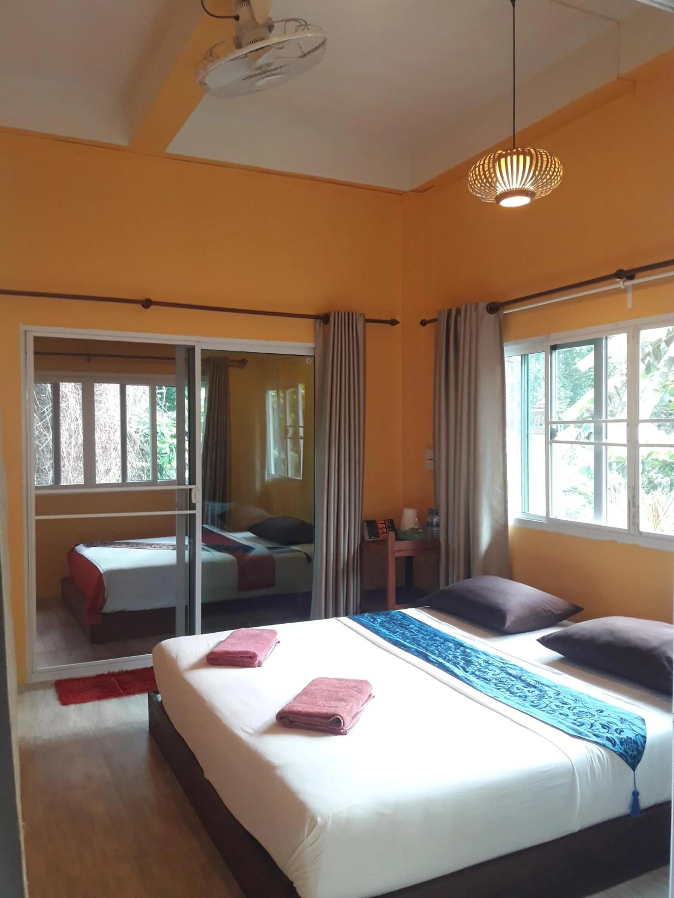 Bed in JJ Beach Resort & JJ Seafood