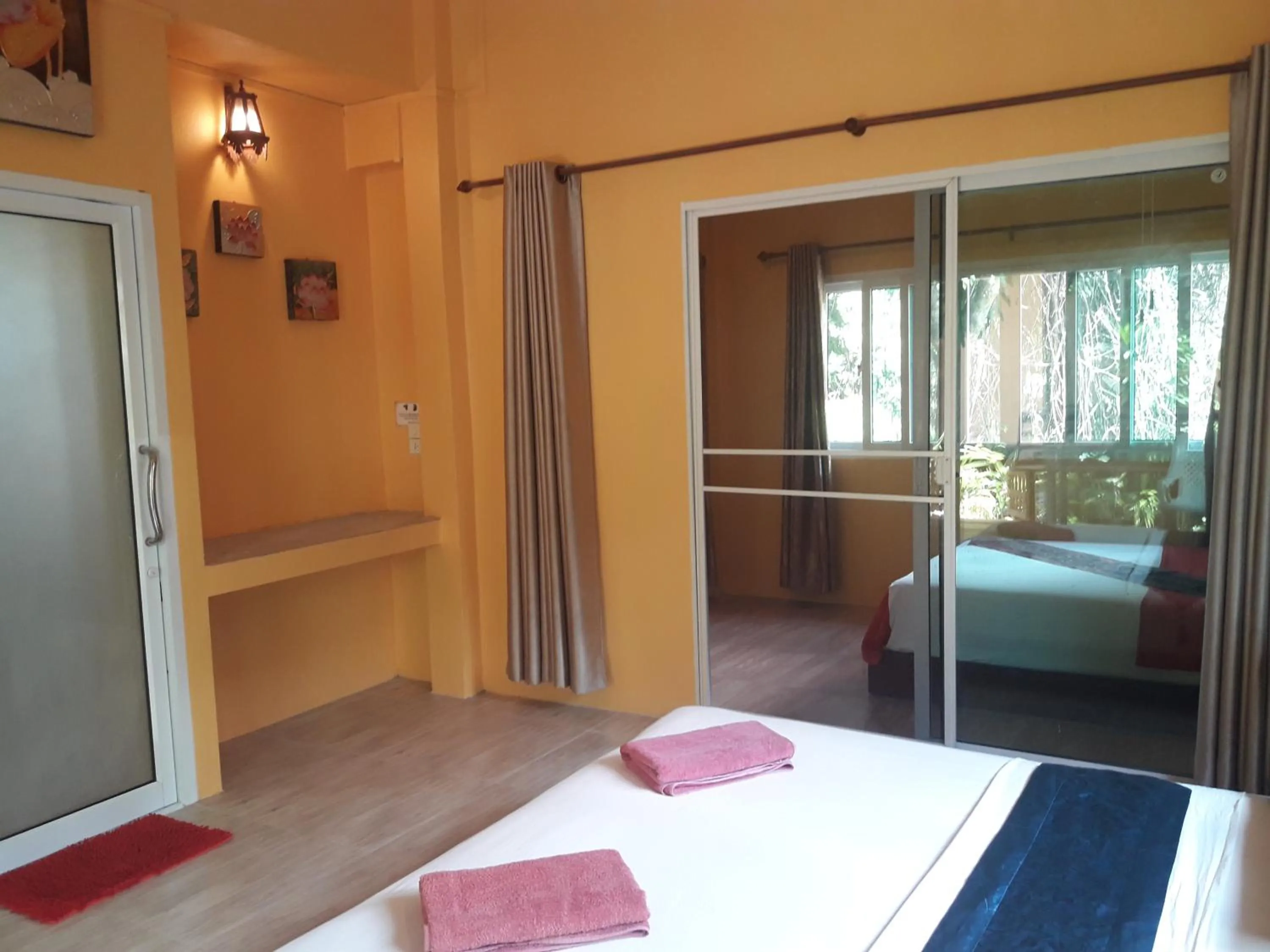 Bed in JJ Beach Resort & JJ Seafood