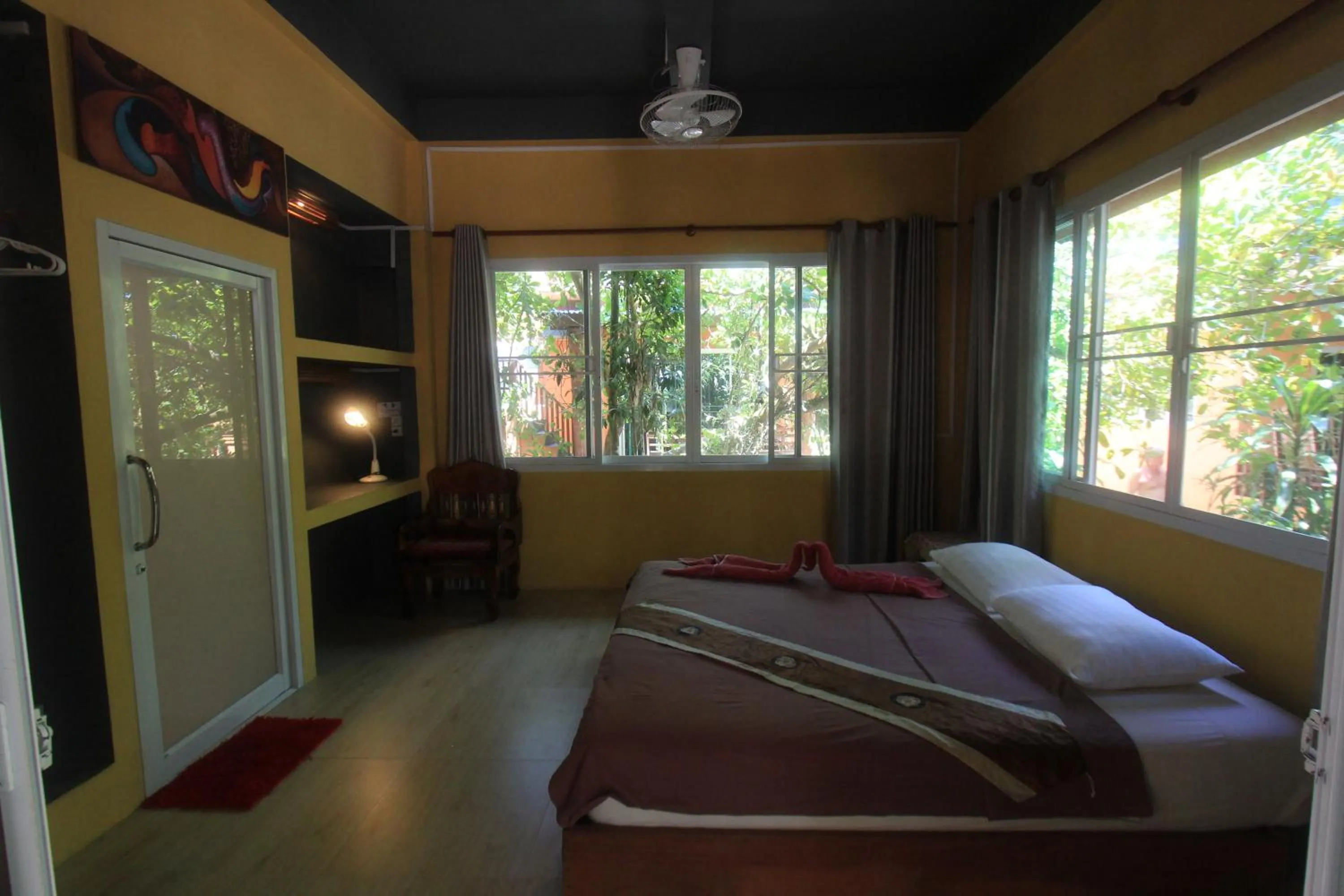 Bed in JJ Beach Resort & JJ Seafood