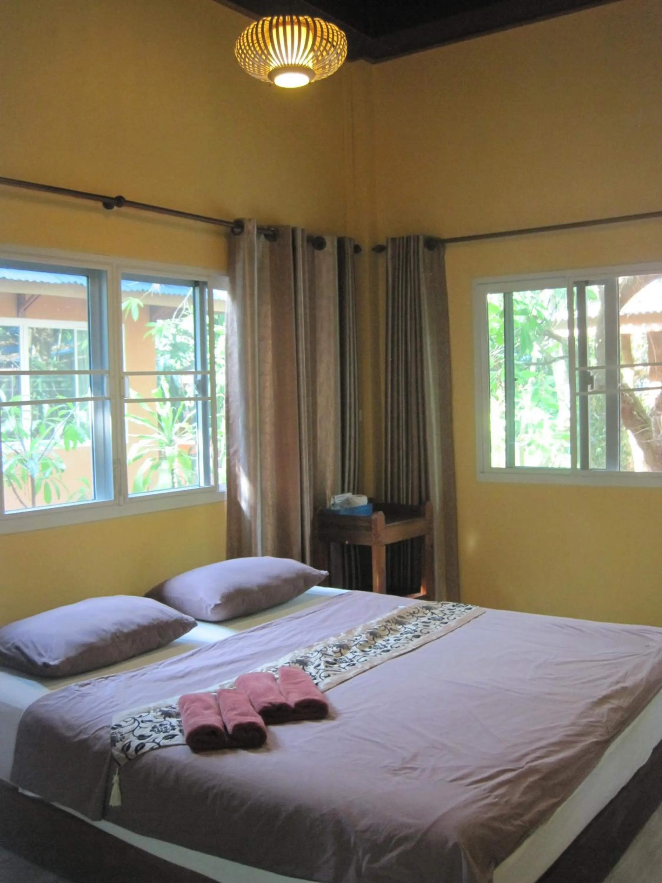 Bed in JJ Beach Resort & JJ Seafood