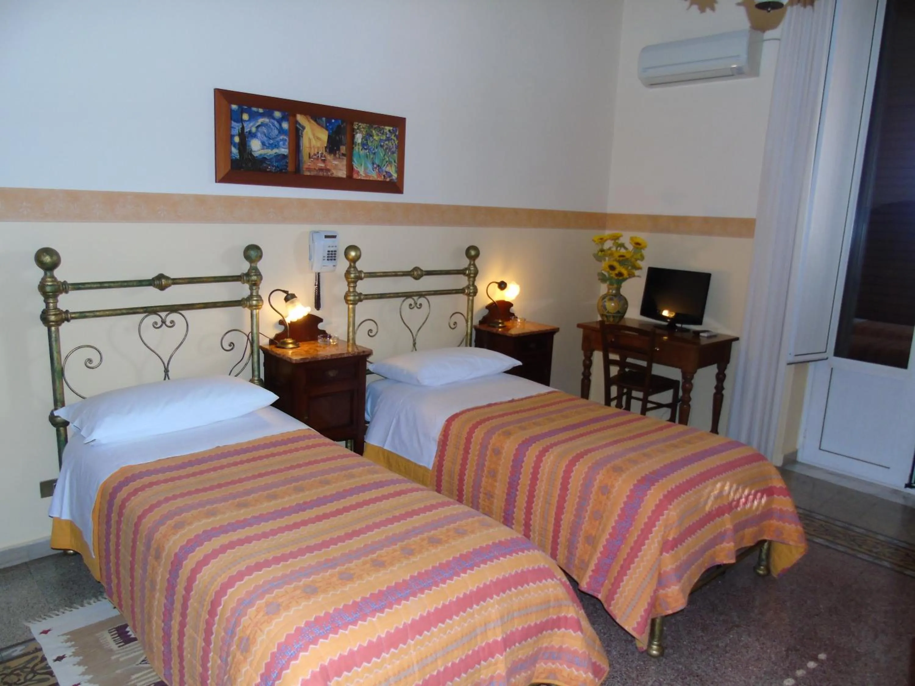 Bed in Albergo Cavour