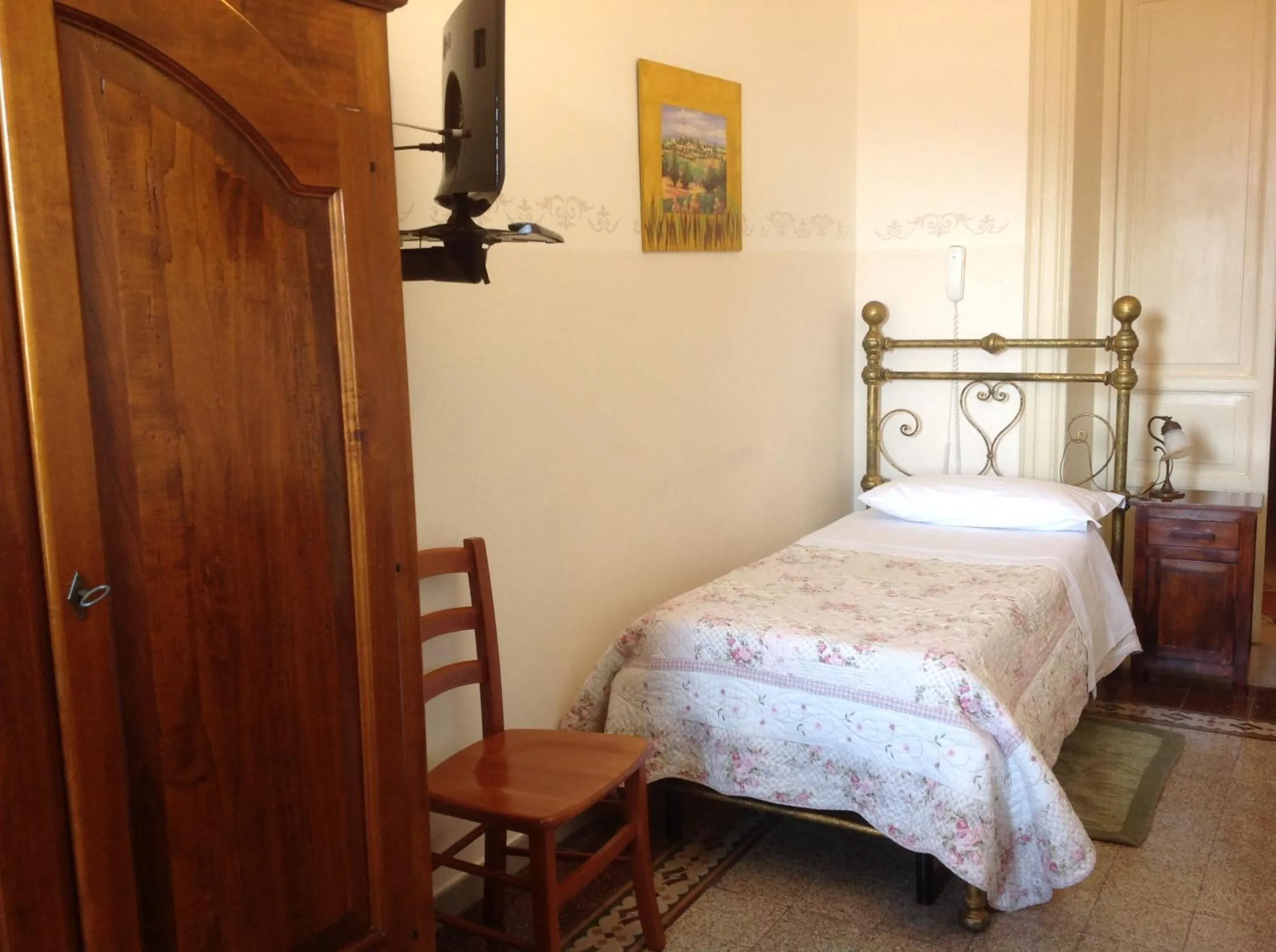 Bed in Albergo Cavour