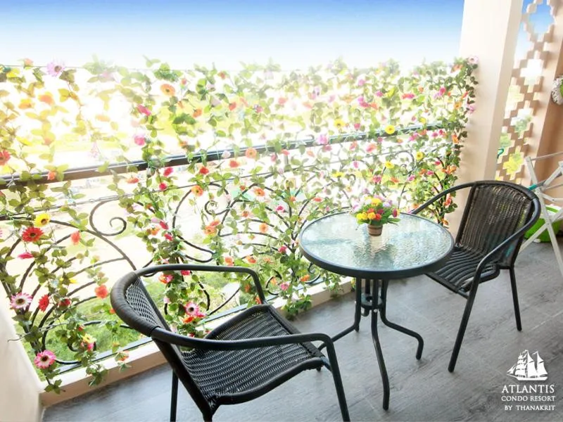 Text overlay in Atlantis Condo & Water Park Pattaya By the Sea