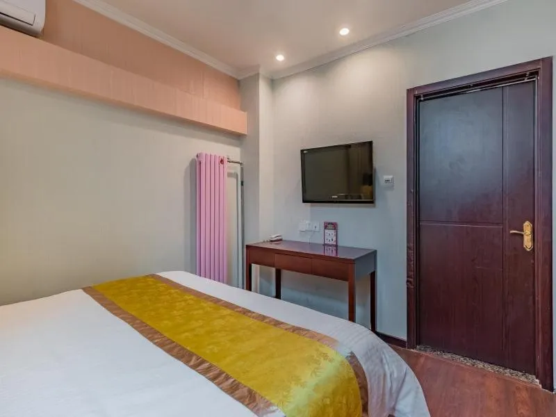 Bed in GreenTree Inn Beijing Yuegezhuang Business Hotel