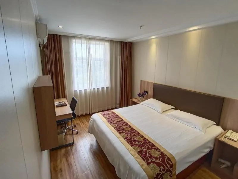 Bed in GreenTree Inn Beijing Fangshan Liangxiang Suzhuang Express Hotel
