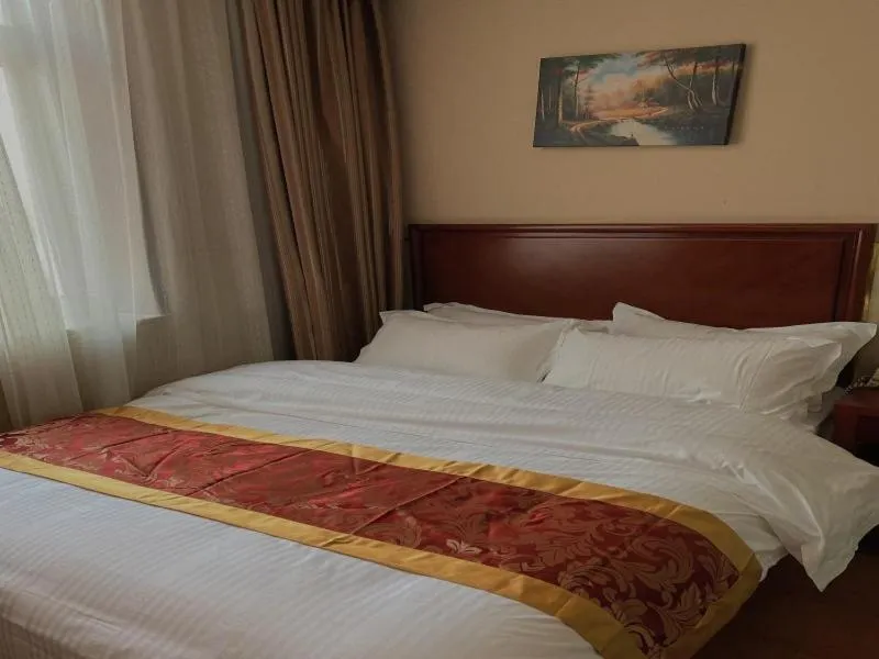 Bed in GreenTree Inn Beijing Shunyi Xinguozhan Express Hotel