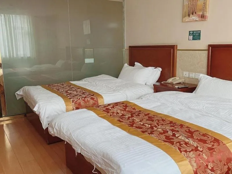 Bed in GreenTree Inn Beijing Shunyi Xinguozhan Express Hotel