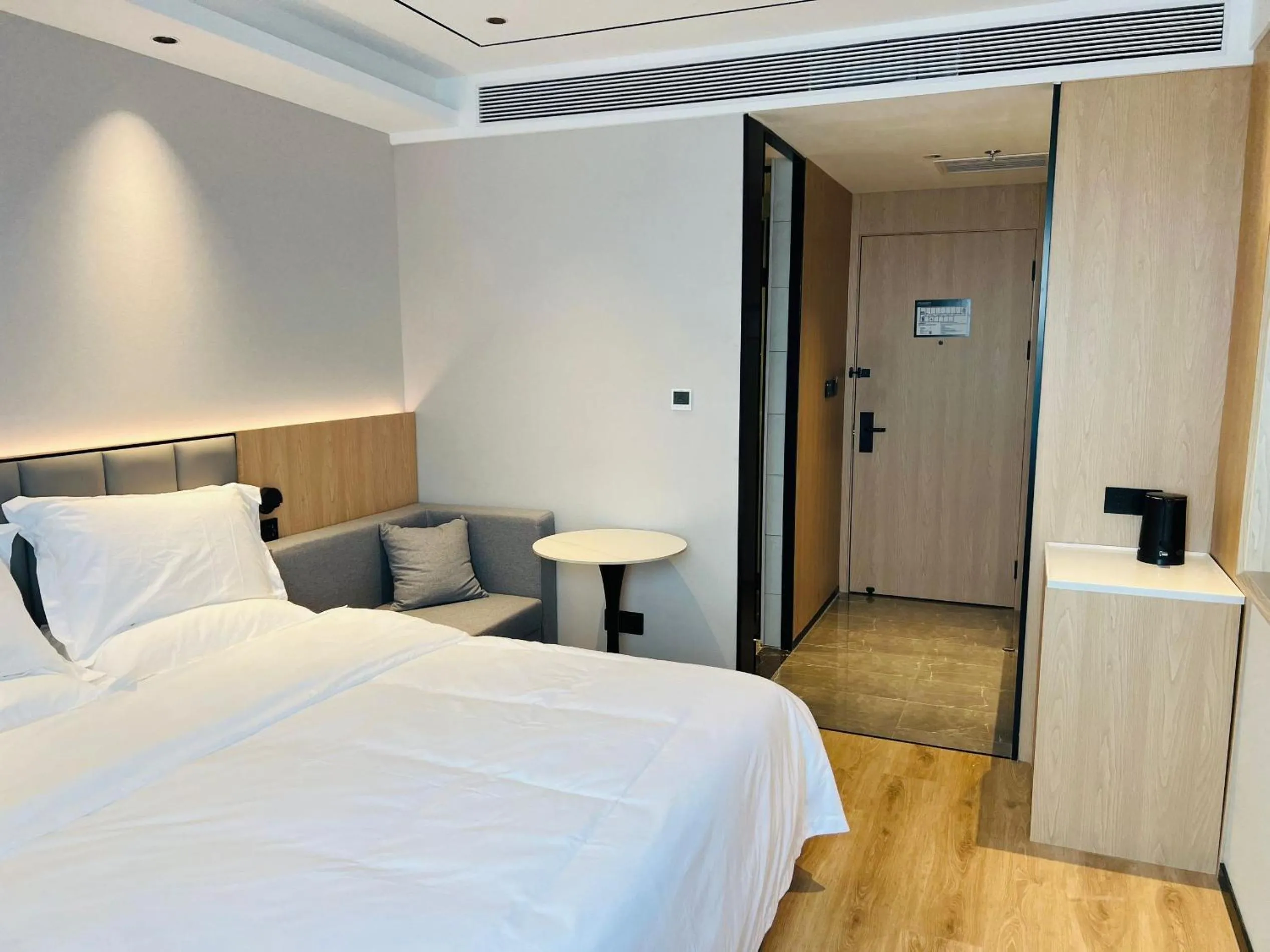Bed in GreenTree Inn Beijing Shunyi South Shiyuan Street Express Hotel