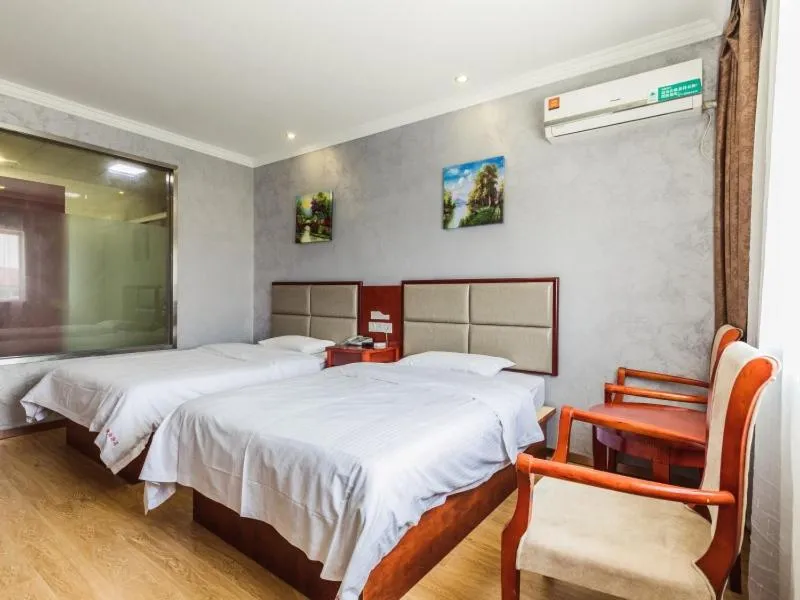 Bed in GreenTree Inn Shanghai Huinan Jinghai Road Express Hotel