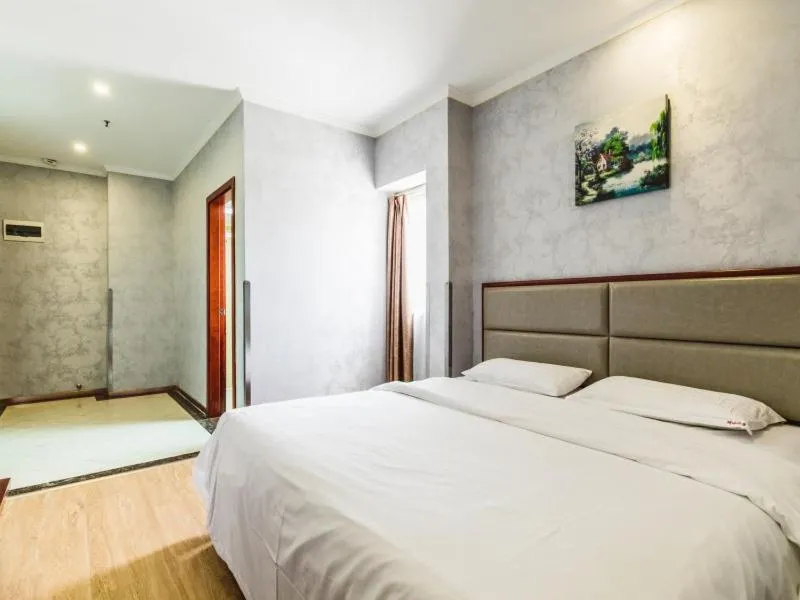 Bed in GreenTree Inn Shanghai Huinan Jinghai Road Express Hotel