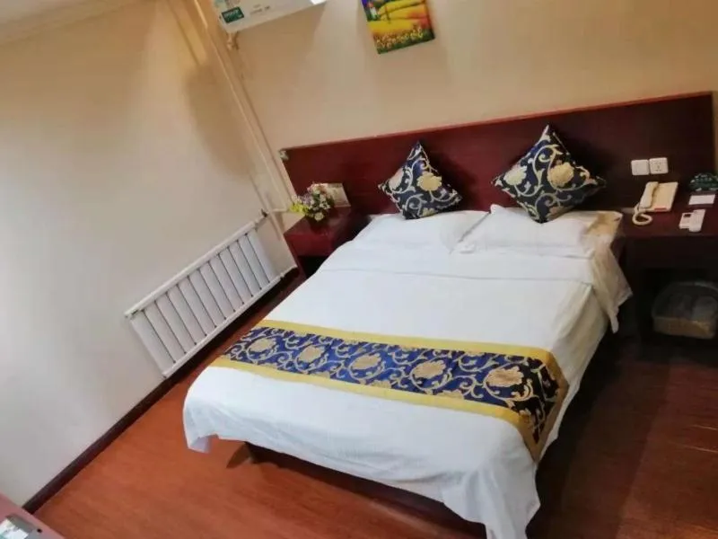 Bed in GreenTree Inn Tianjin Beiyang Bridge Business Hotel