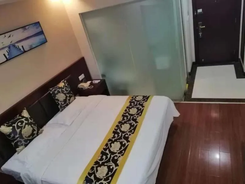 Bed in GreenTree Inn Tianjin Beiyang Bridge Business Hotel