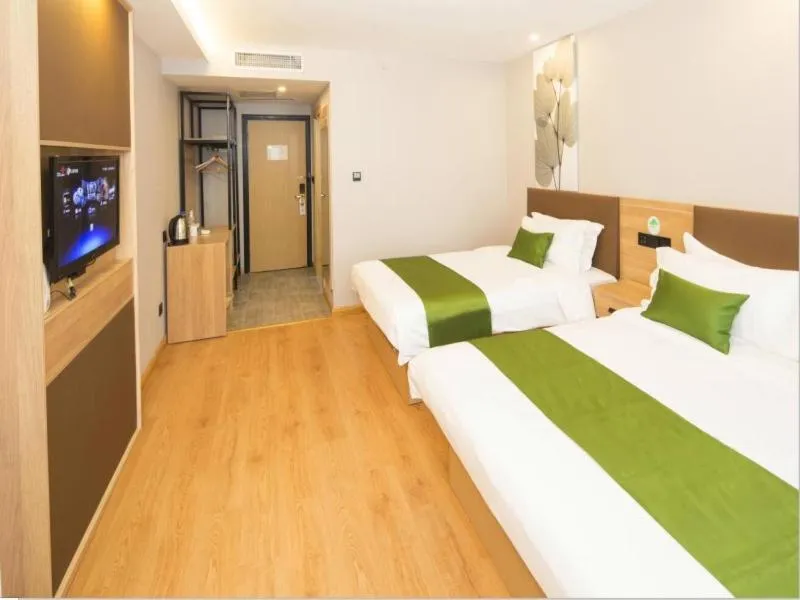 Bed in GreenTree Inn Tianjin Xiqing Development Zone Renrenle Square Express Hotel