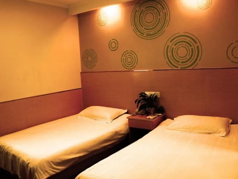 Bed in GreenTree Inn Jiangsu Nanjing Olympic Sports Center Express Hotel